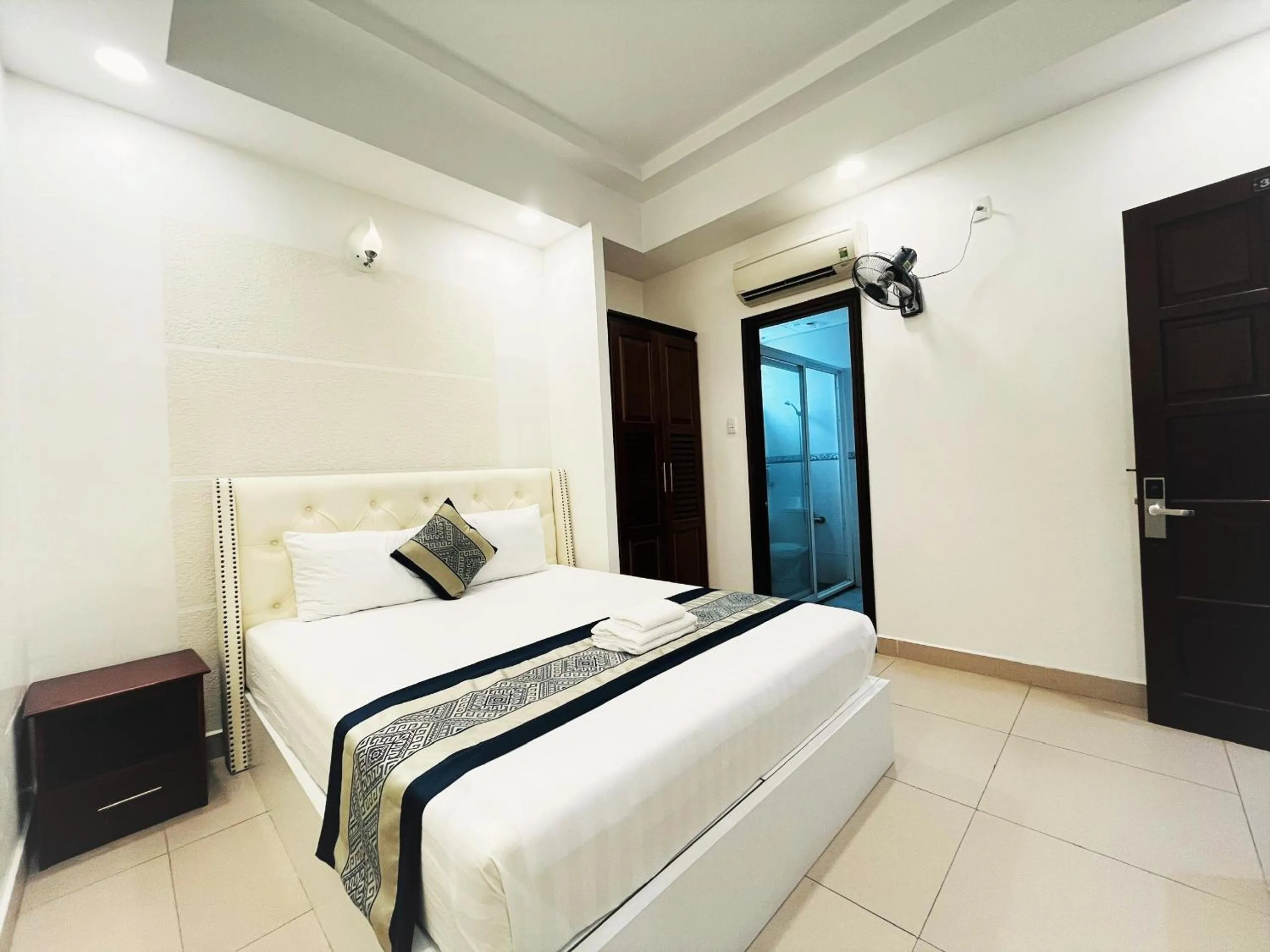 Bed in DINH DINH 2 AIRPORT HOTEL