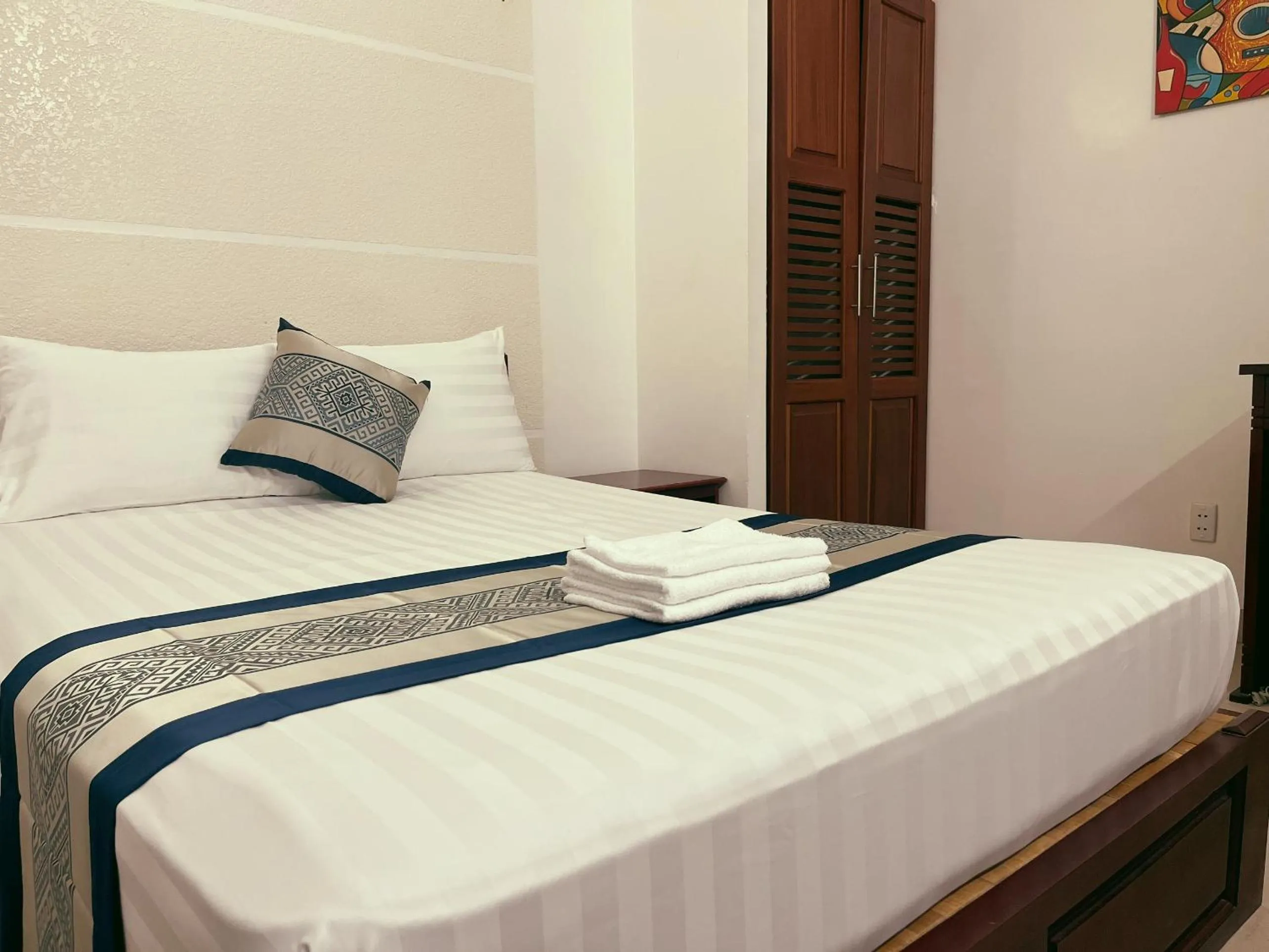 Bed in DINH DINH 2 AIRPORT HOTEL