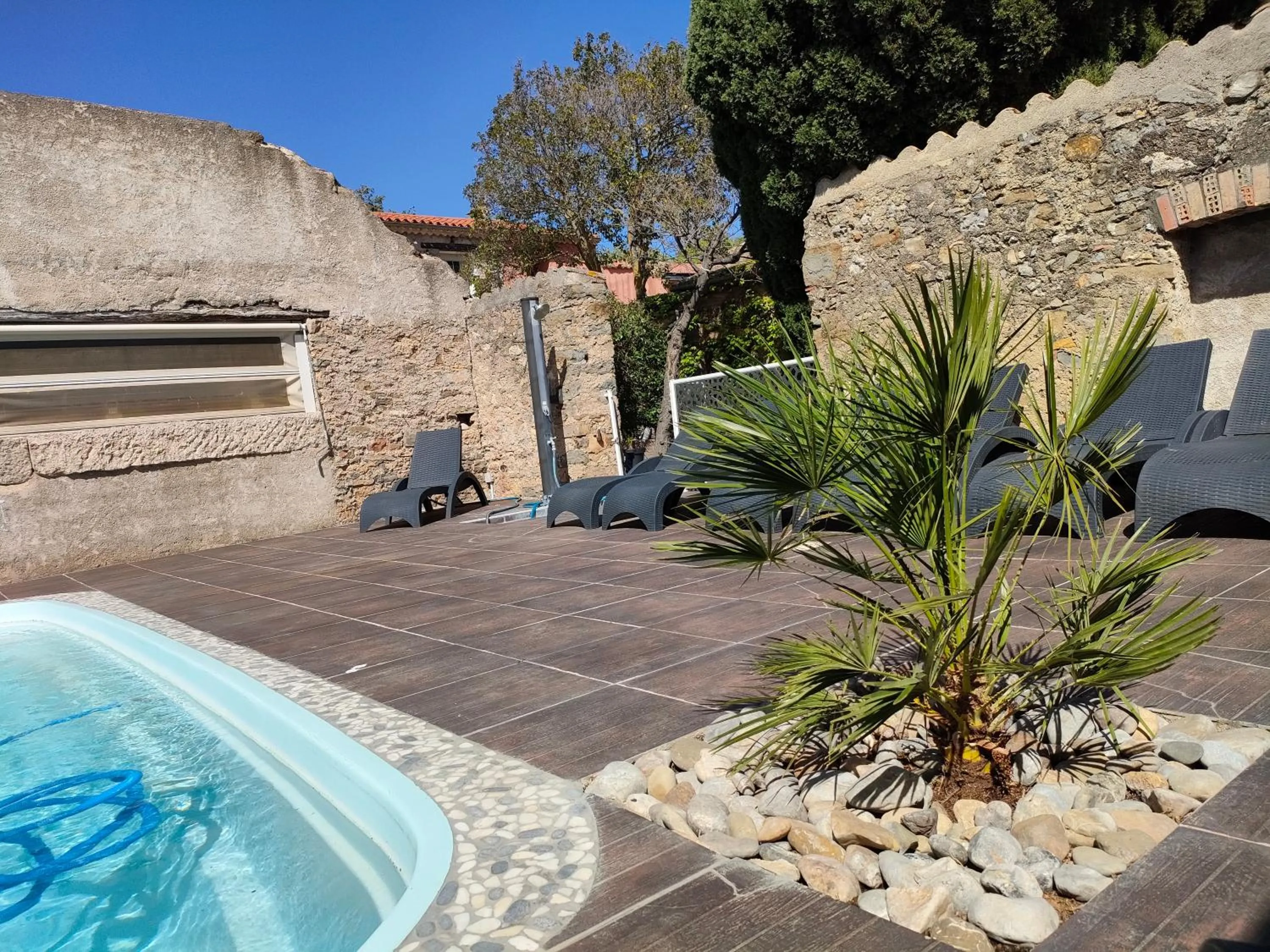 Patio in Hôtel Restaurant L'Art des Mets by Côté Jardin