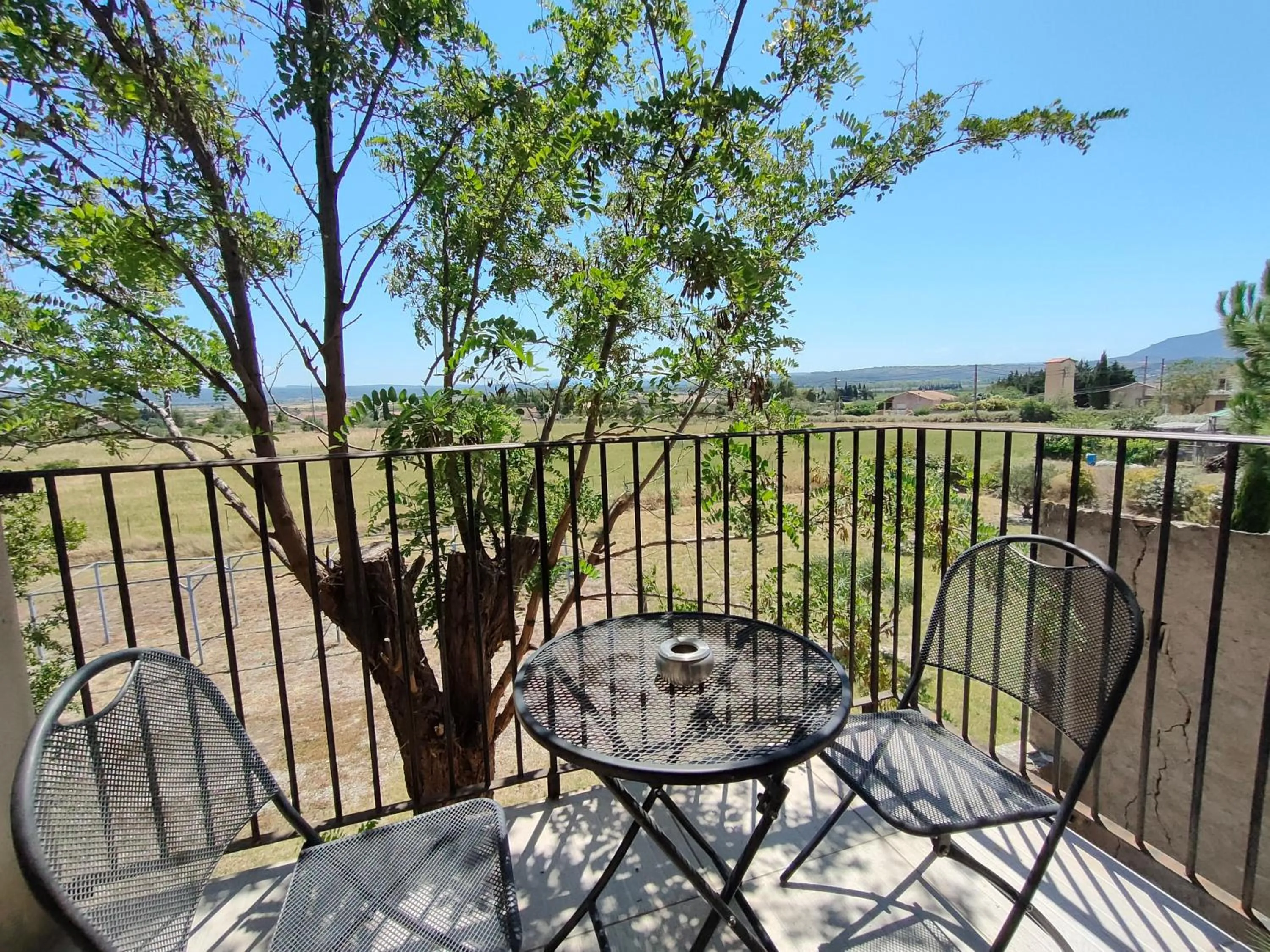 Balcony/Terrace in Hôtel Restaurant L'Art des Mets by Côté Jardin