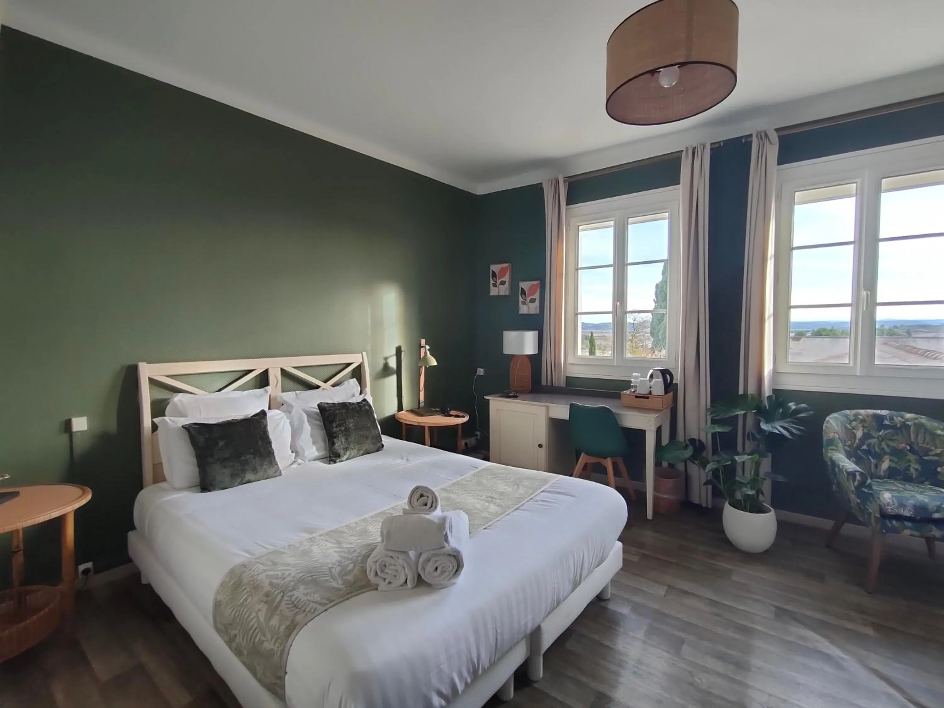 Bed in Hôtel Restaurant L'Art des Mets by Côté Jardin