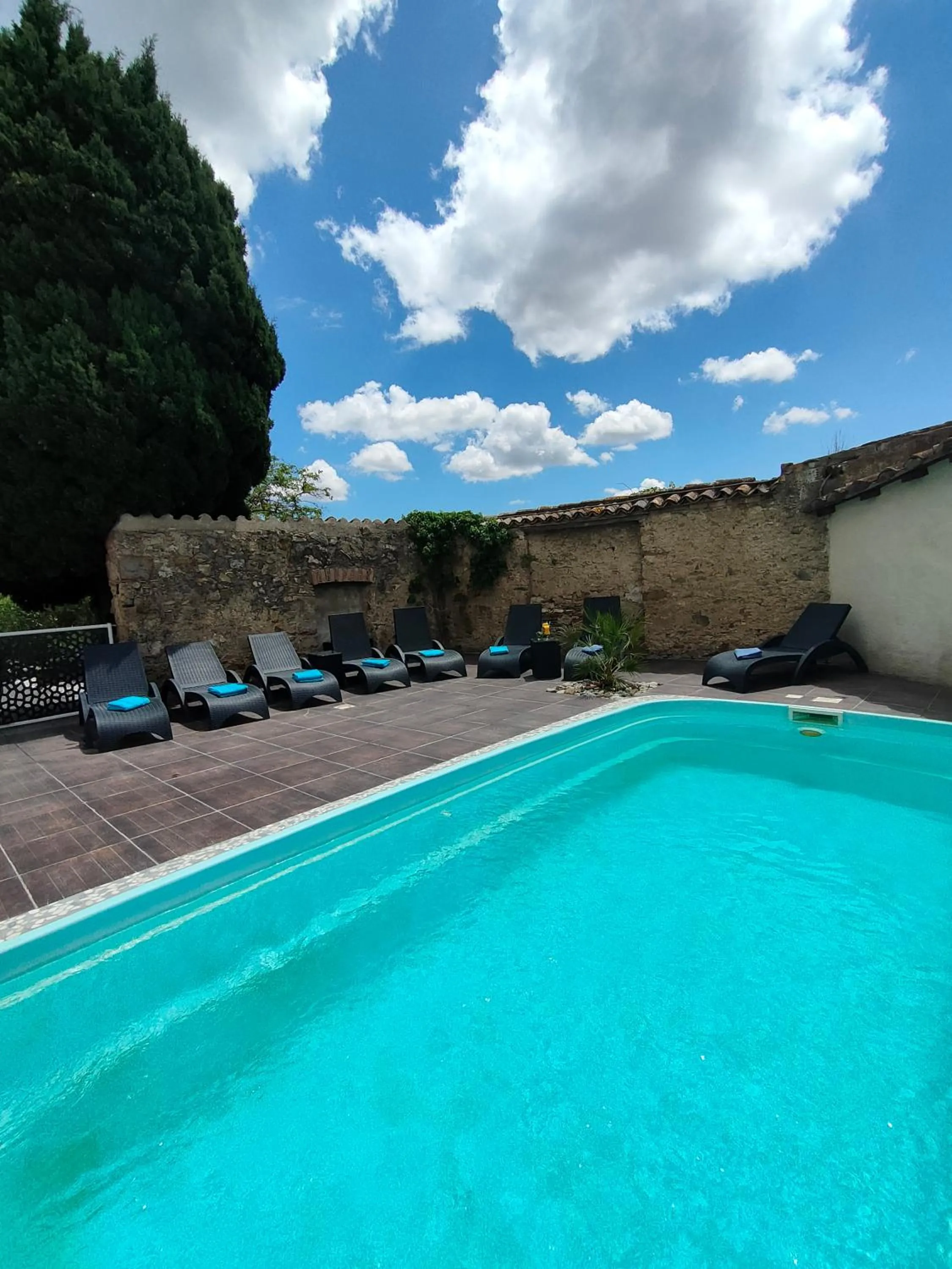 Pool view in Hôtel Restaurant L'Art des Mets by Côté Jardin