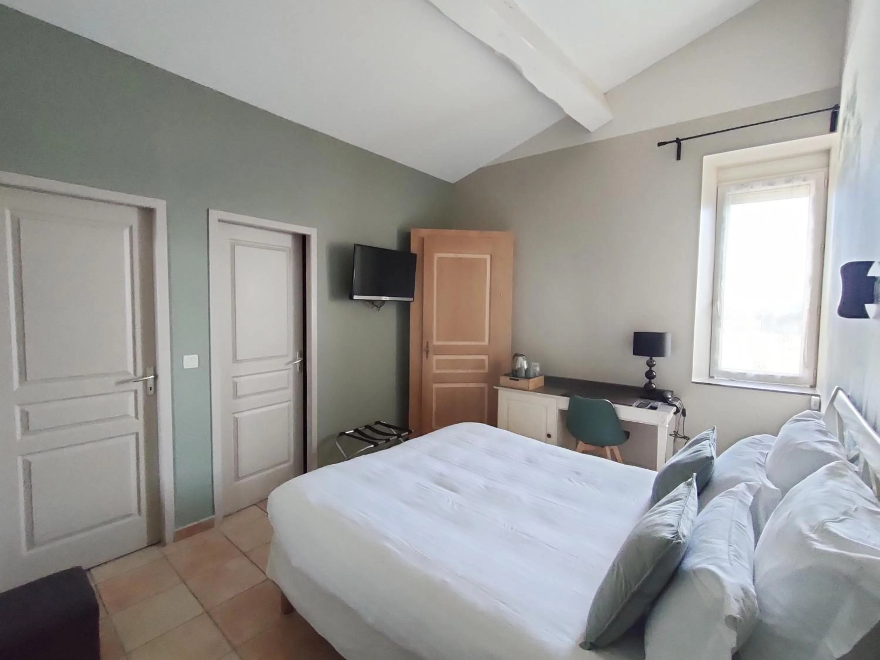 Photo of the whole room, Bed in Hôtel Restaurant L'Art des Mets by Côté Jardin