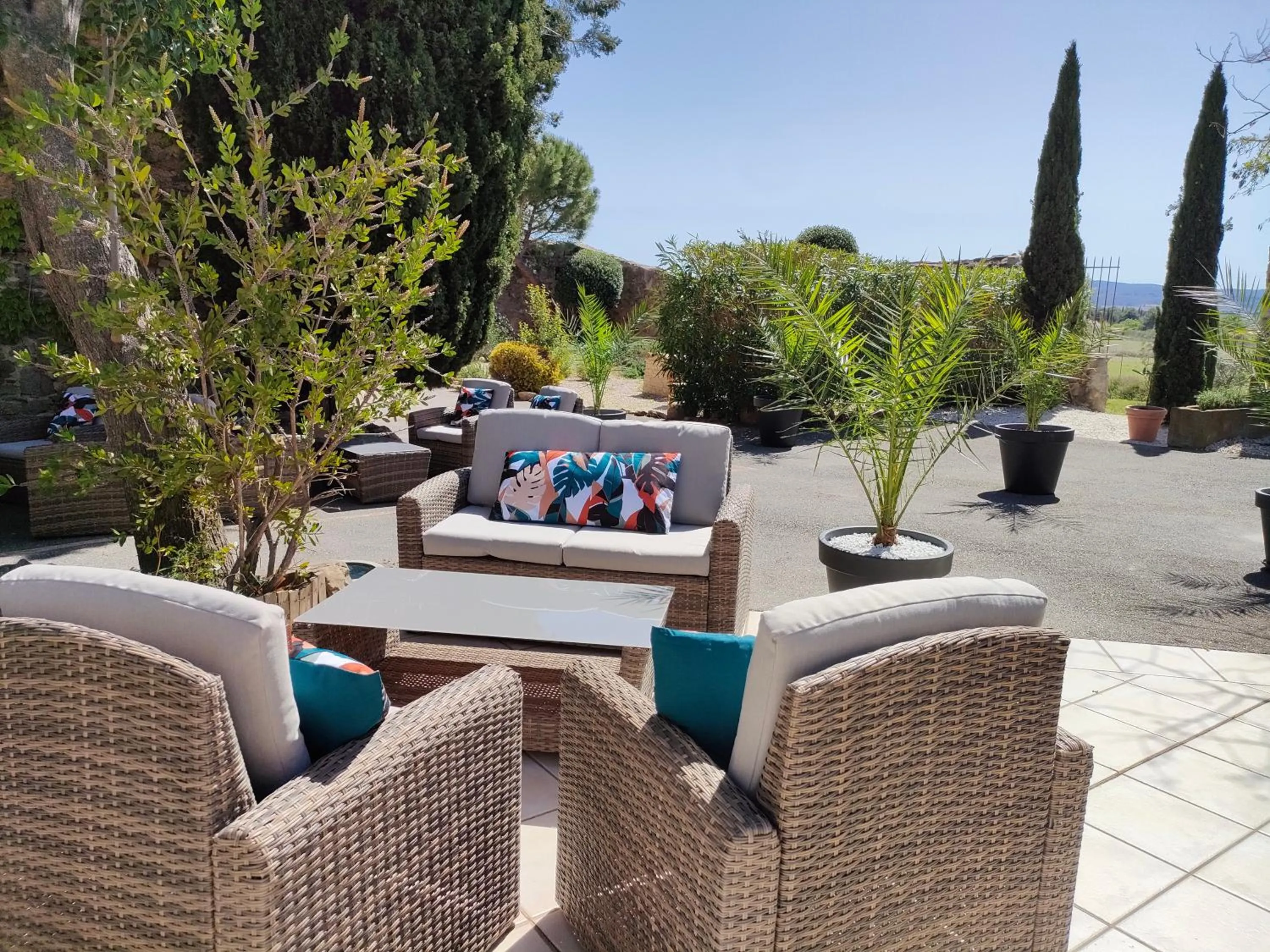 Balcony/Terrace in Hôtel Restaurant L'Art des Mets by Côté Jardin