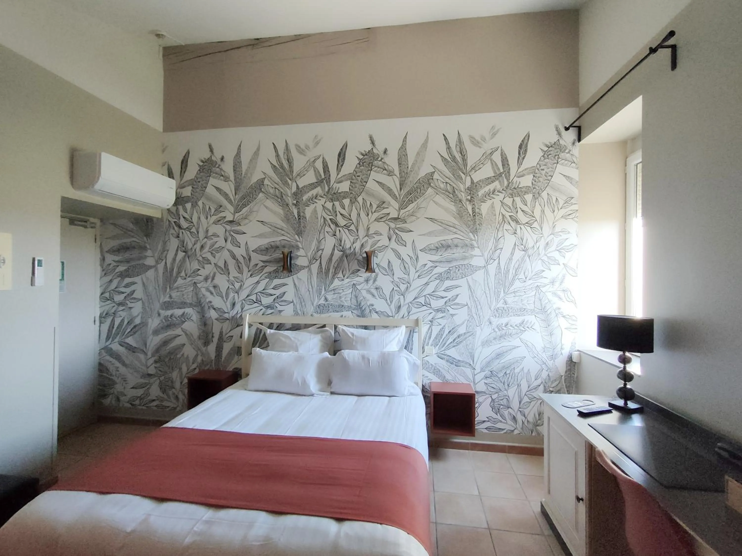 Photo of the whole room, Bed in Hôtel Restaurant L'Art des Mets by Côté Jardin