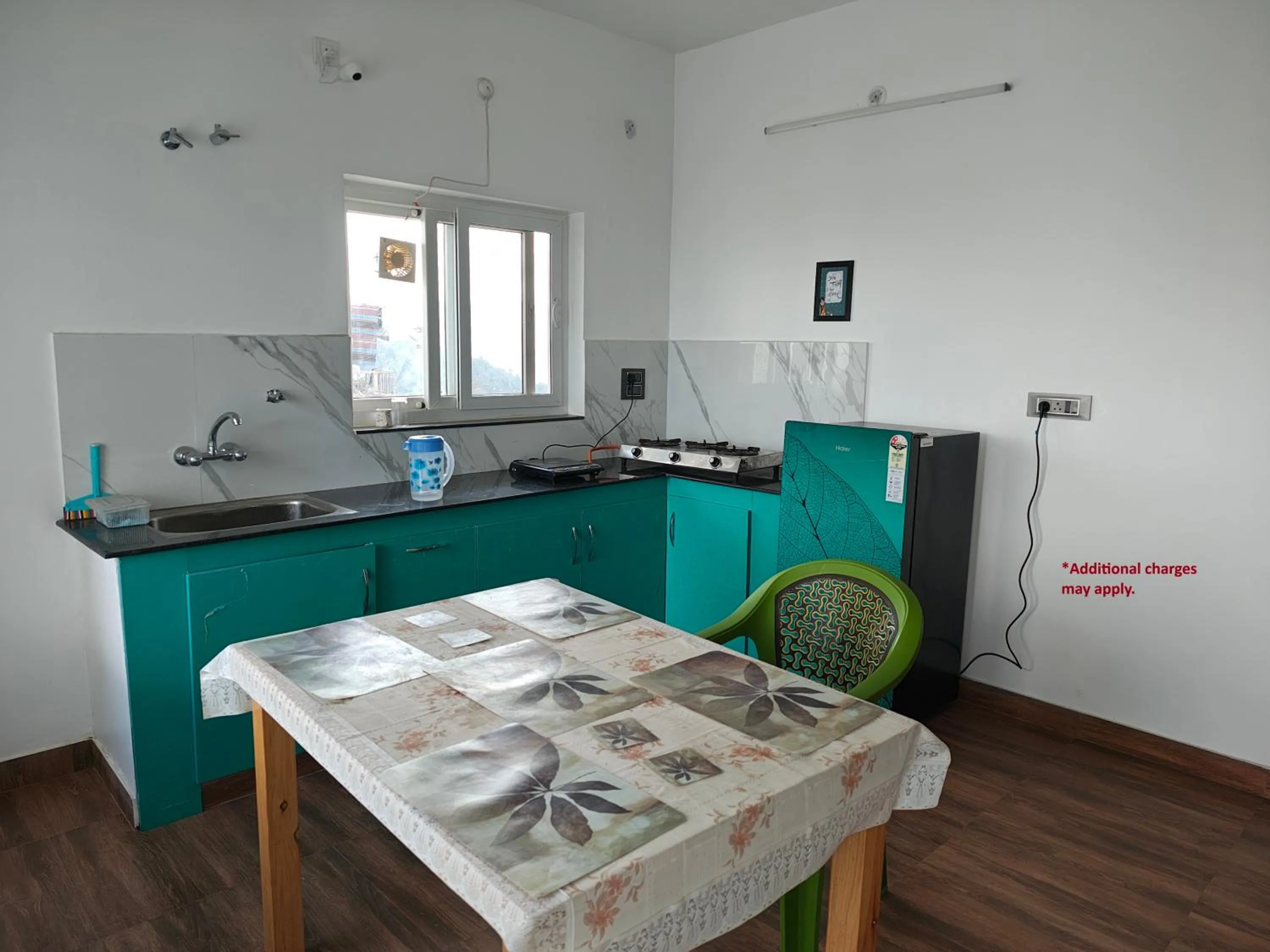 Kitchen or kitchenette in Abhi's Cottage