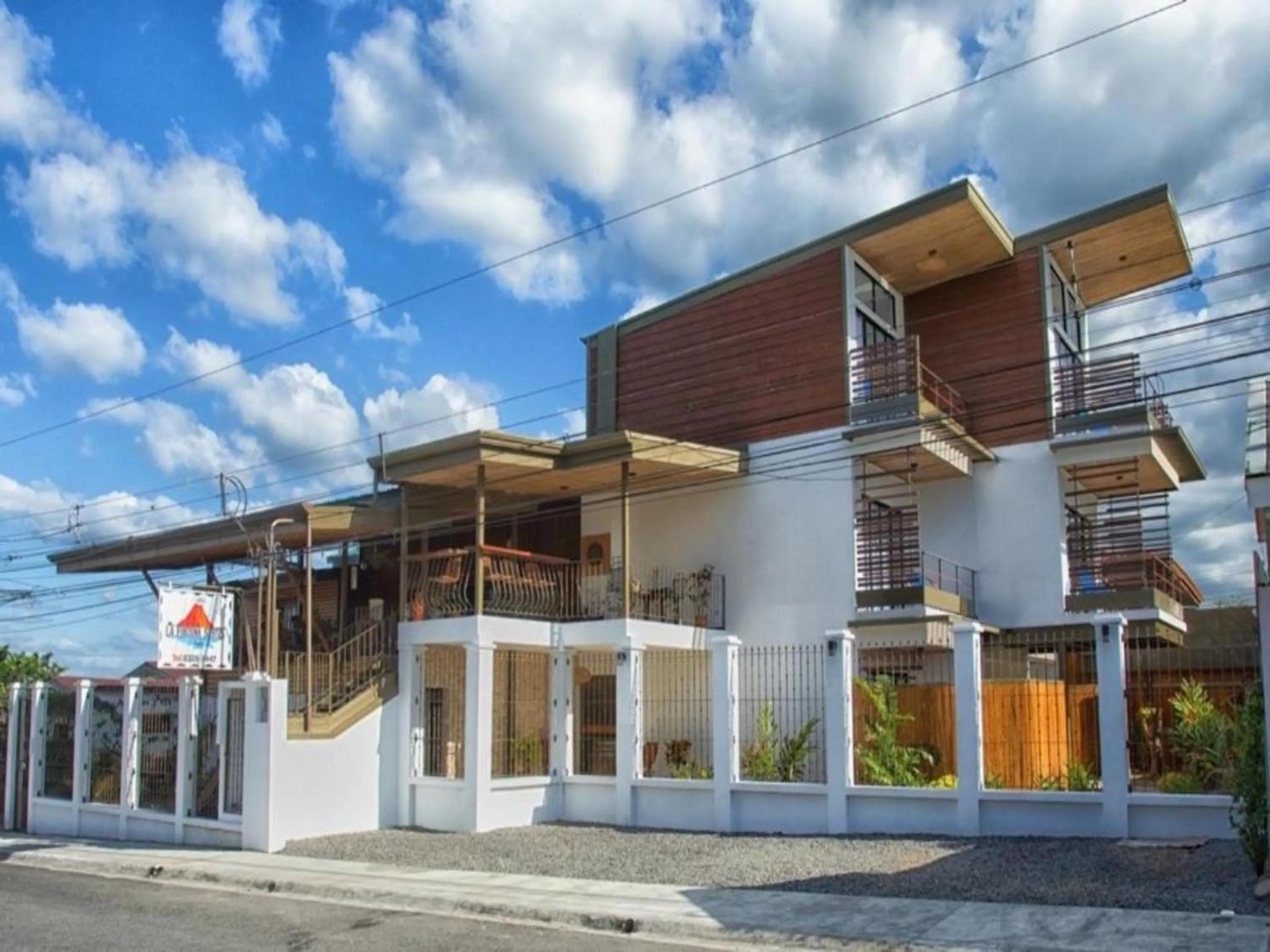 Property building in La Fortuna Lodge by Treebu Hotels