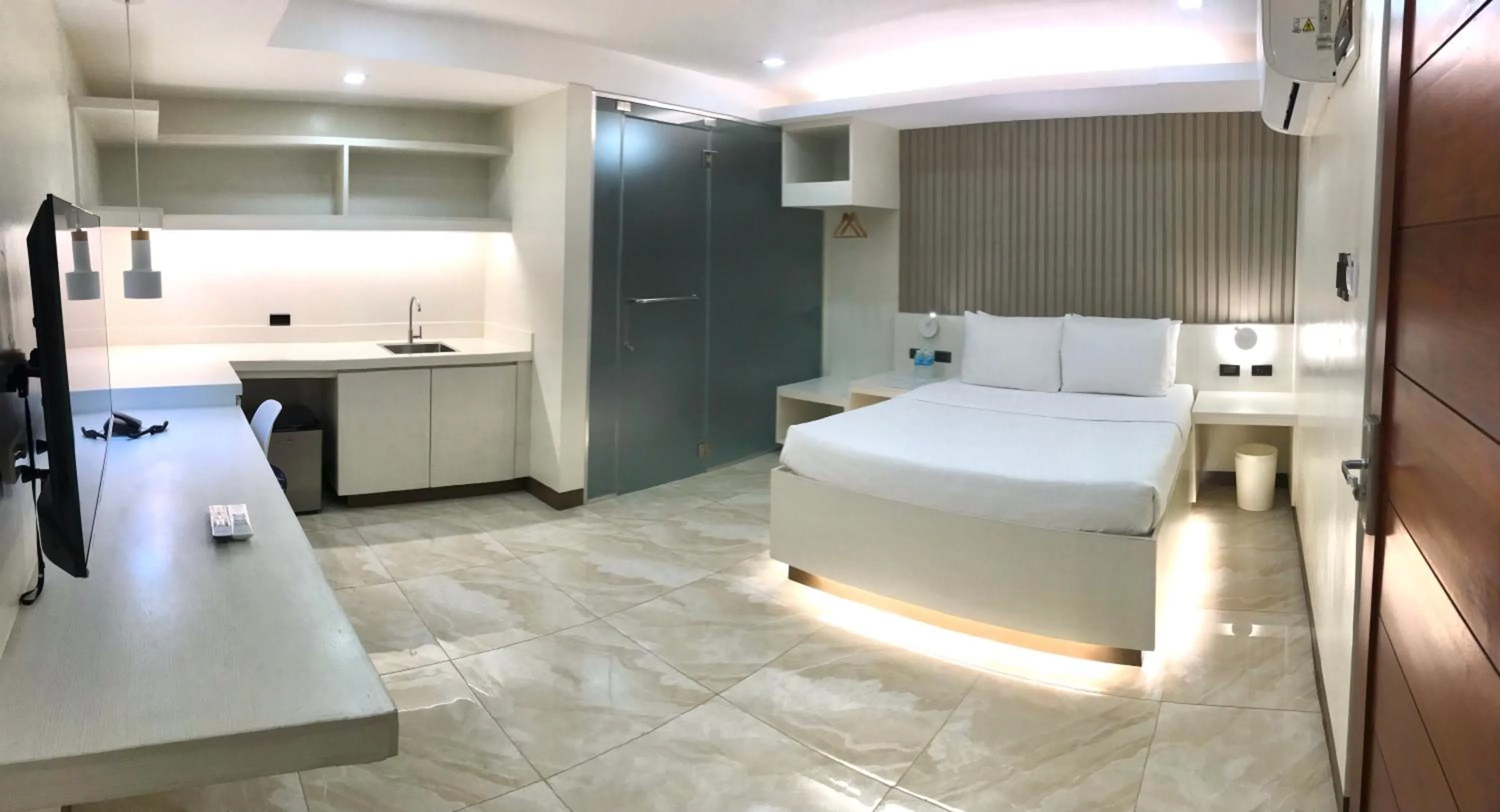 Bed in Oyster Plaza Hotel