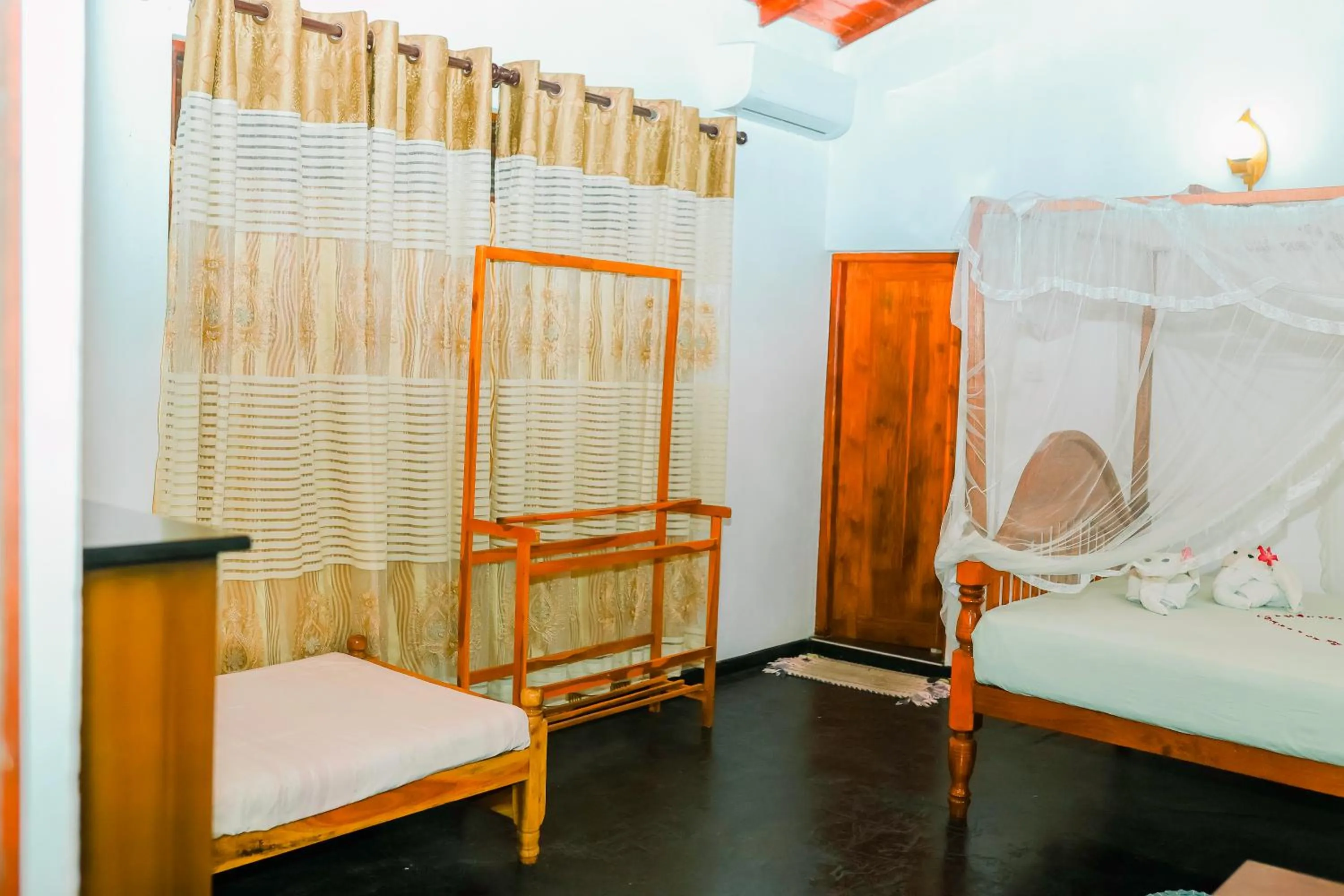 Bed in Beach Lagoon Guesthouse