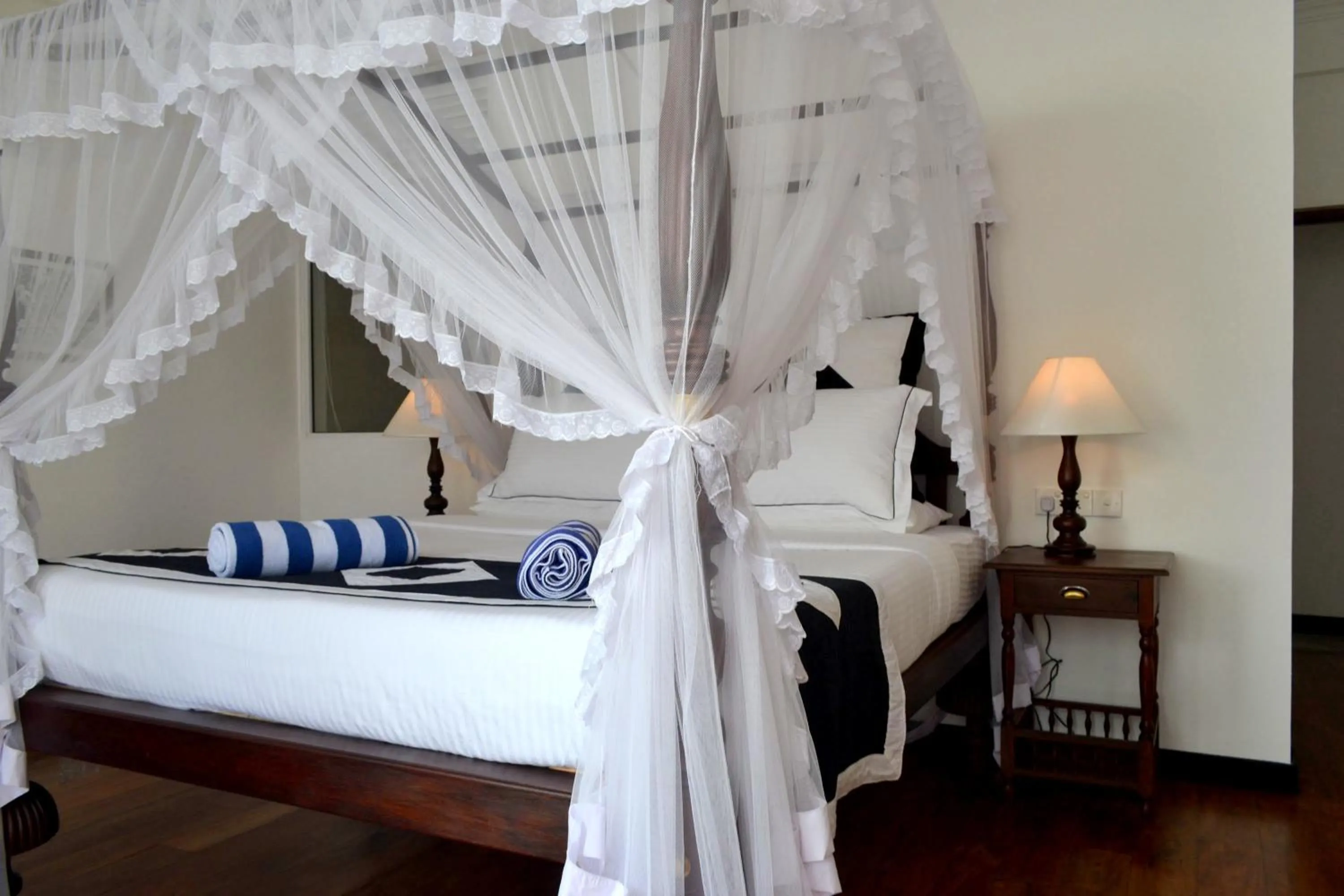 Bed in Sea World Boutique Hotel