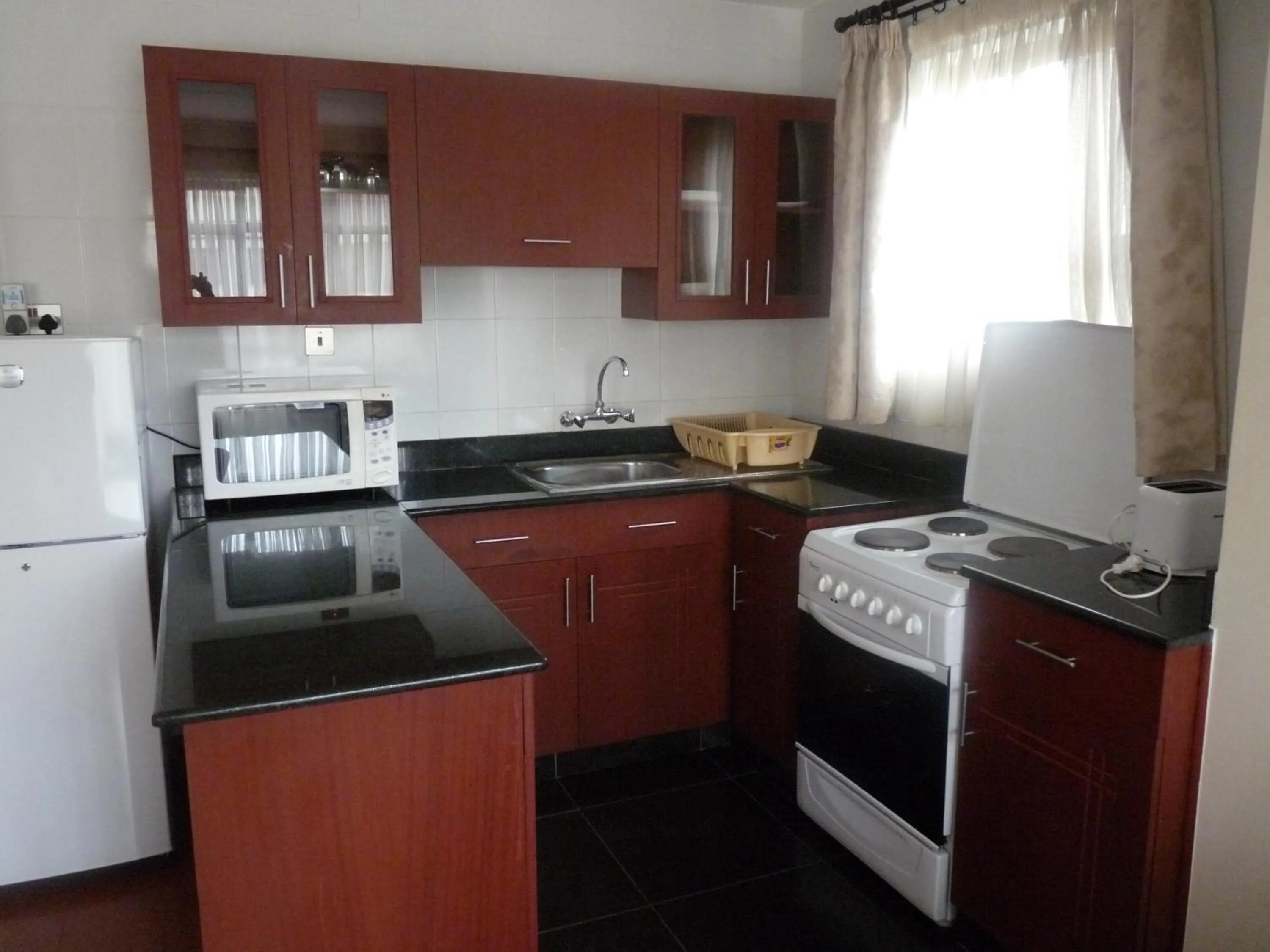 Kitchen or kitchenette in Norfolk Towers Serviced Apartment -Nairobi, City Centre CBD