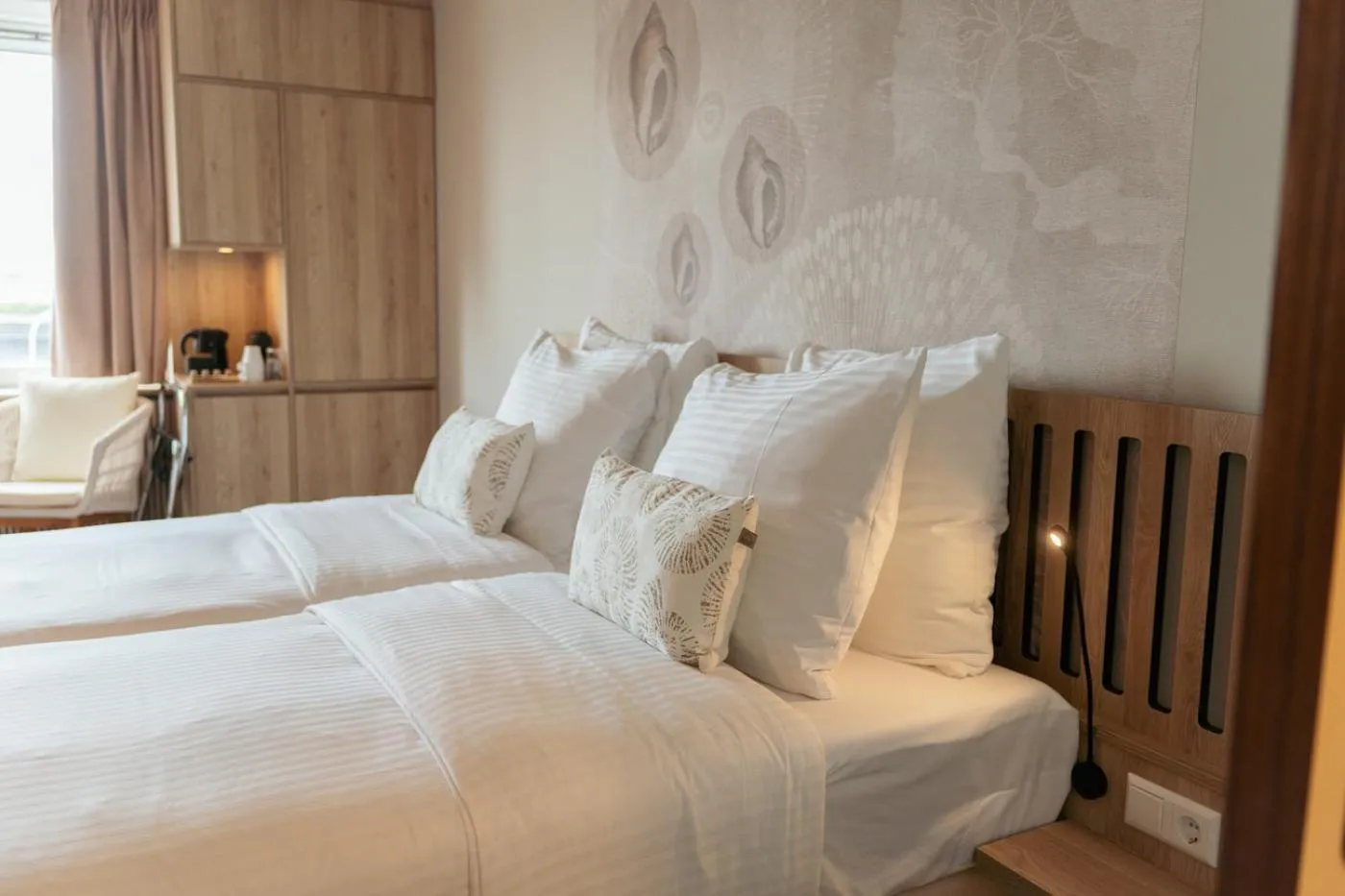 Bed in Beachfront Boutiquehotel