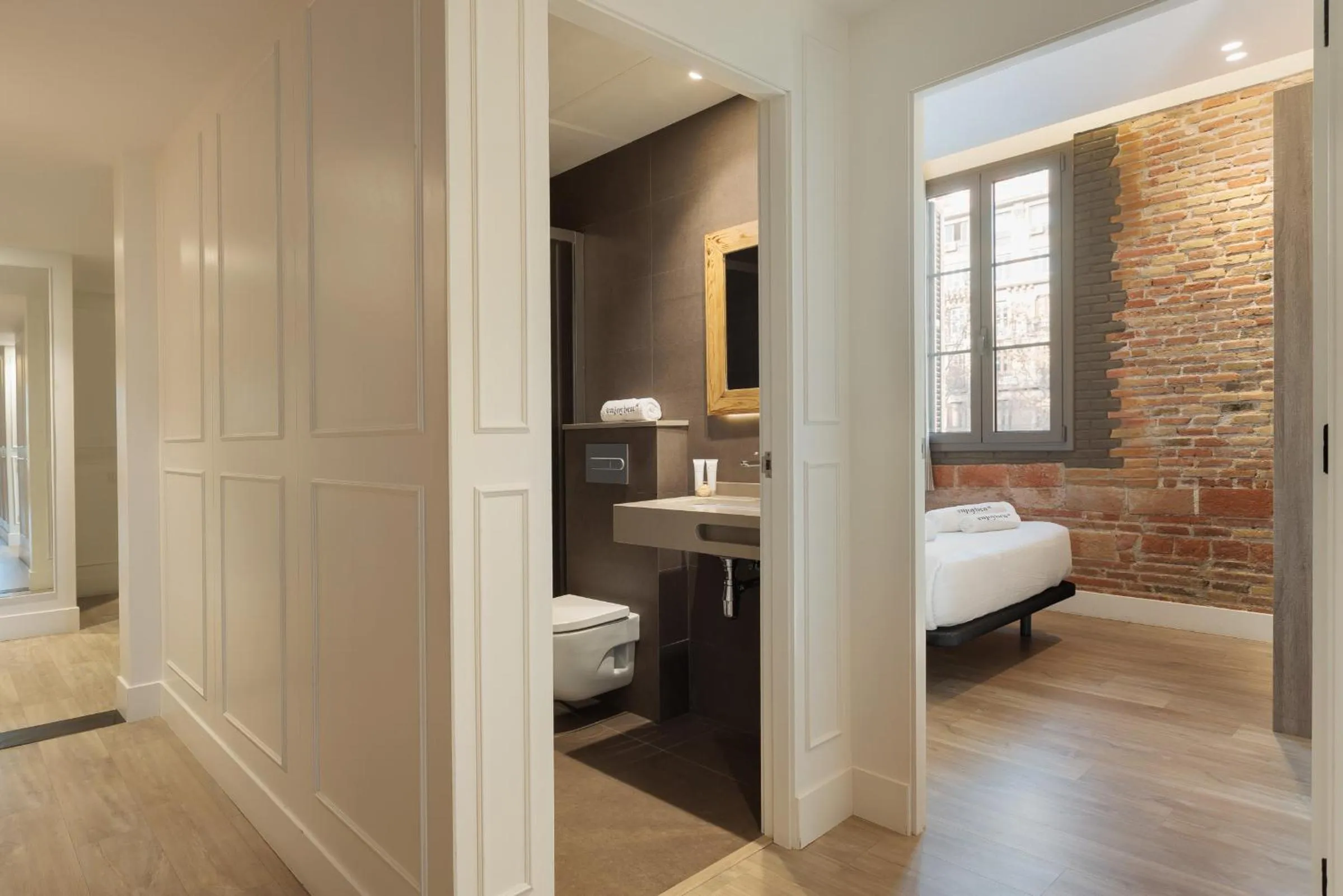 Bed in Enjoybcn Miro Apartments