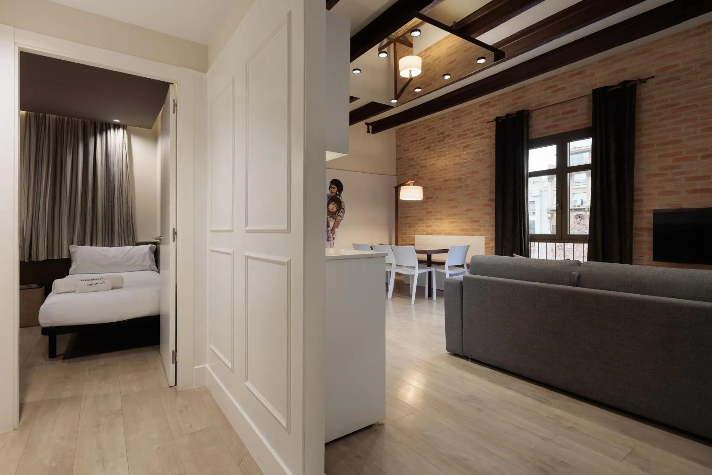 Bed in Enjoybcn Miro Apartments