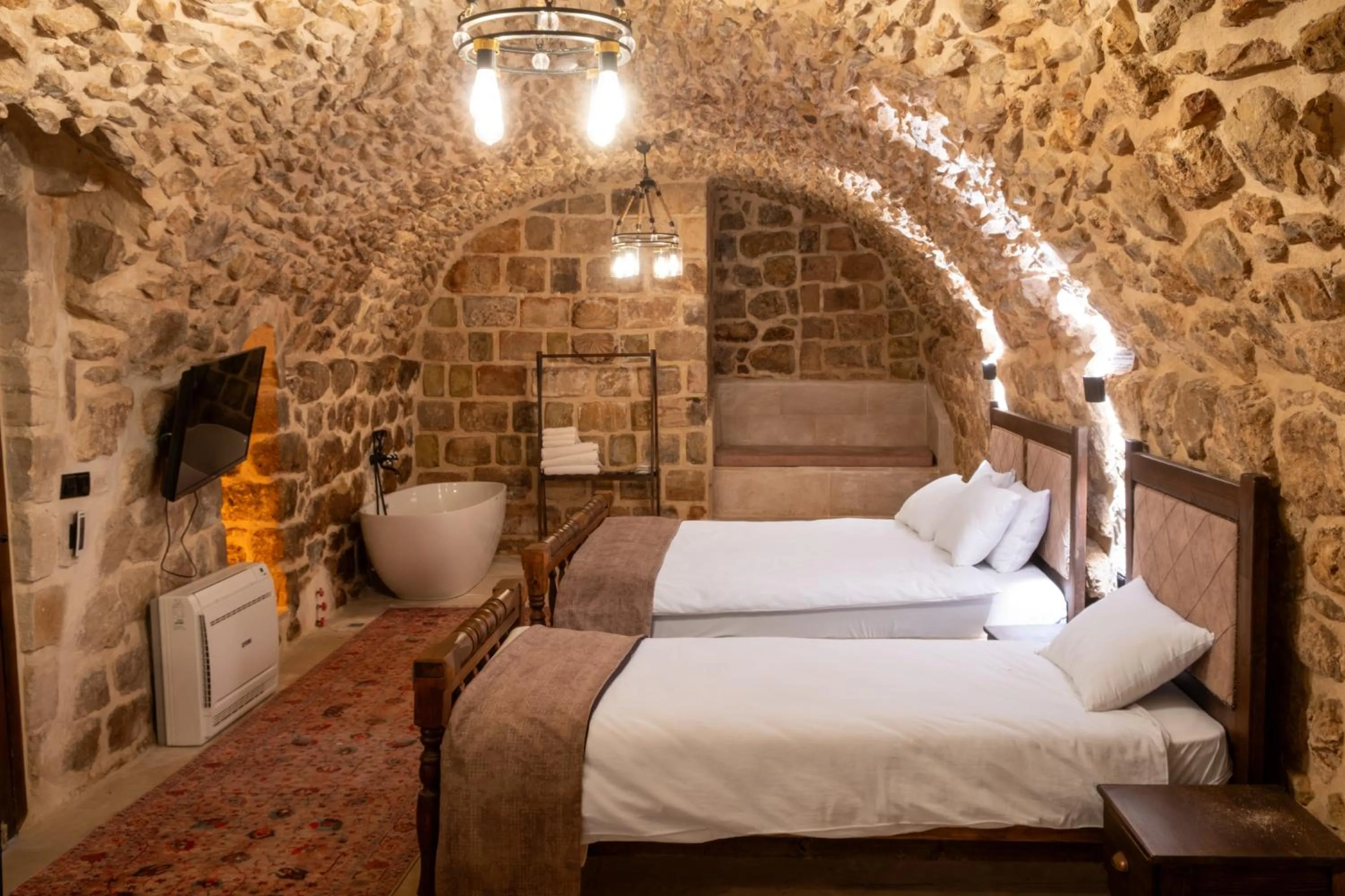 Bed in Marvel Hotel Mardin