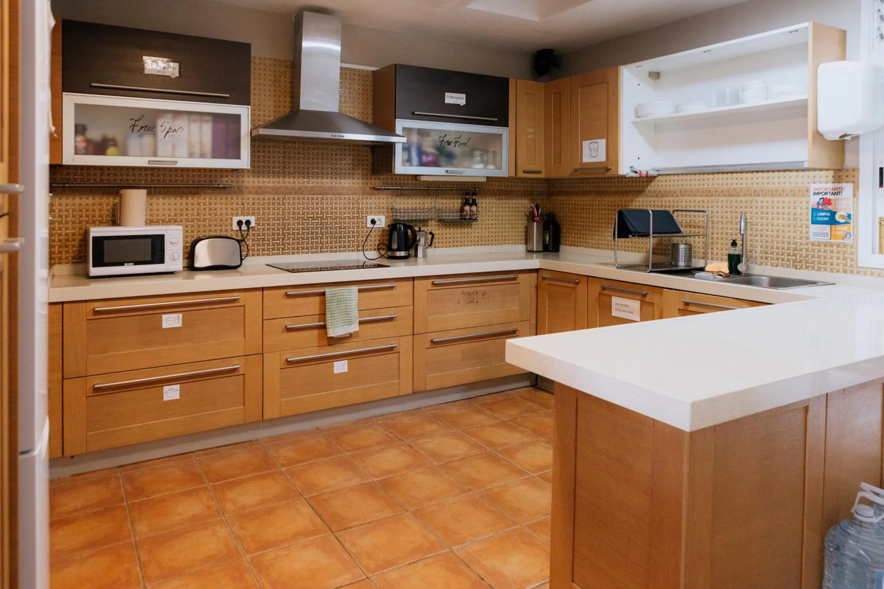 Communal kitchen in Endless Summer Hostel