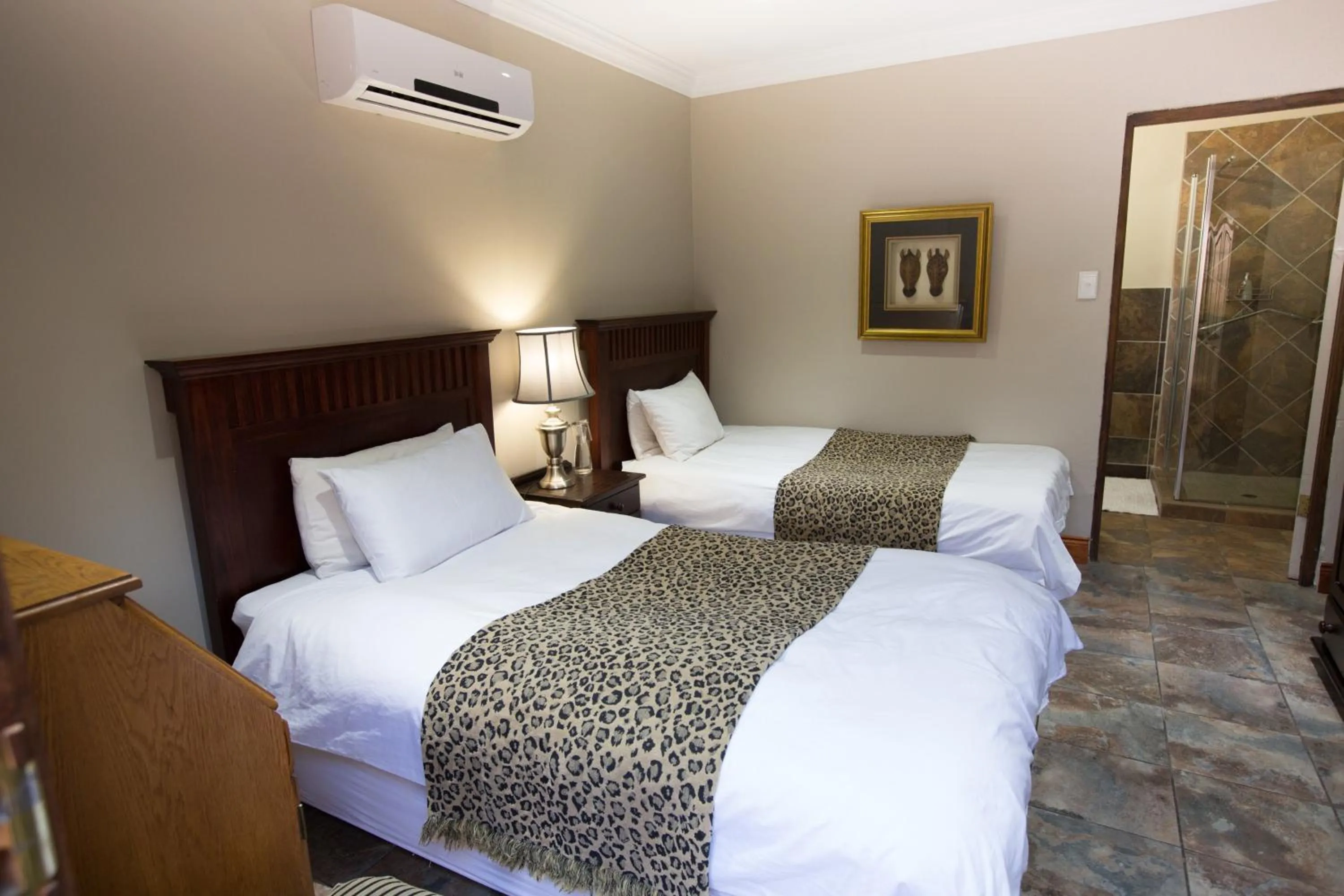 Bed in MacGregors Guest House