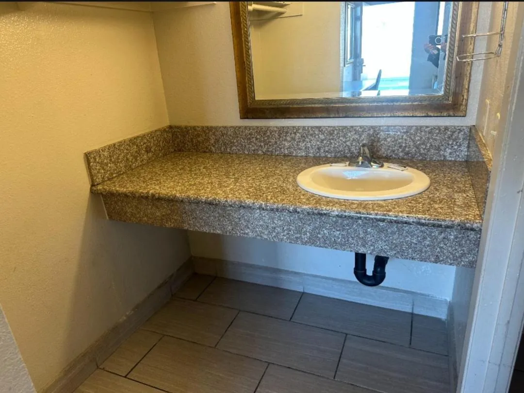 Bathroom in Best Economy Inn & Suites