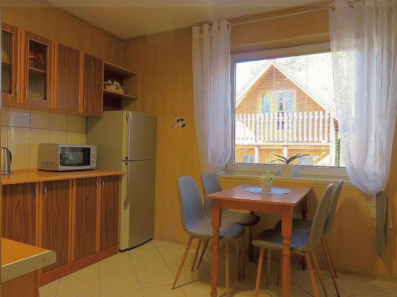 Kitchen or kitchenette in Domki ogrzewane Sokół
