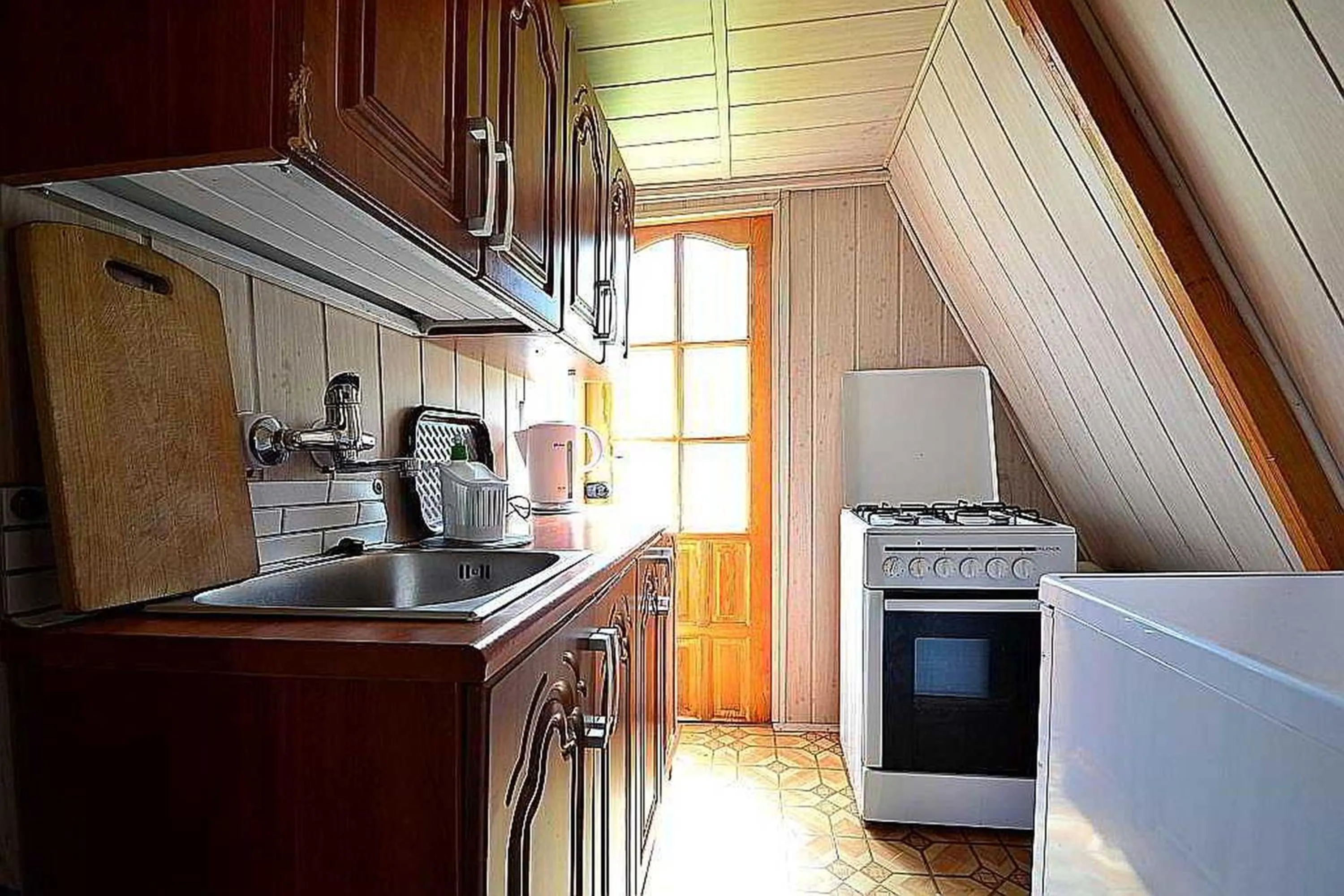 Kitchen or kitchenette in Domki ogrzewane Sokół