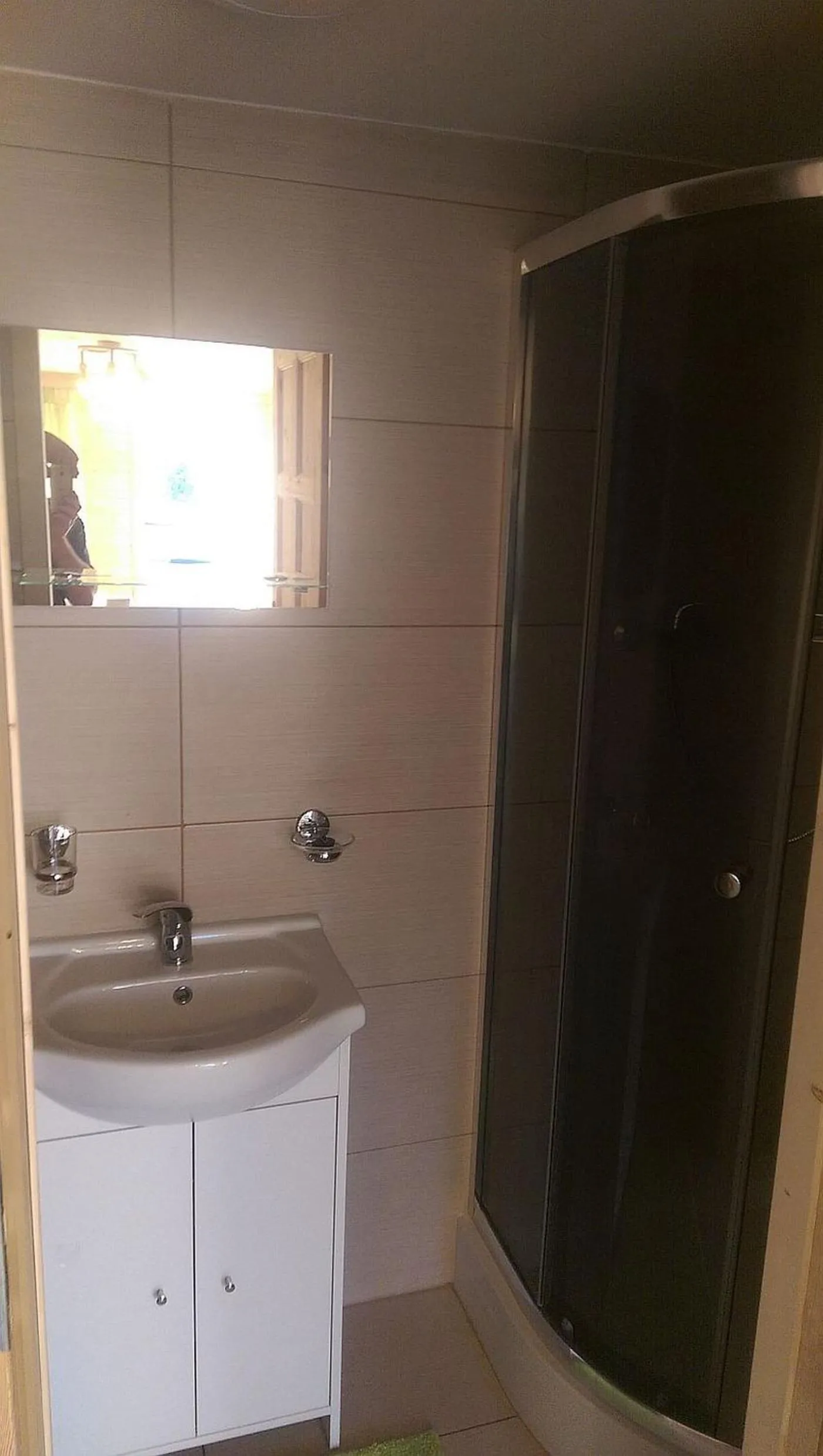 Shower in Domki ogrzewane Sokół