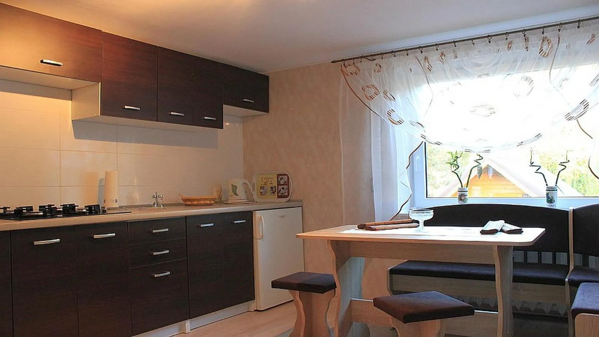 Kitchen or kitchenette in Domki ogrzewane Sokół
