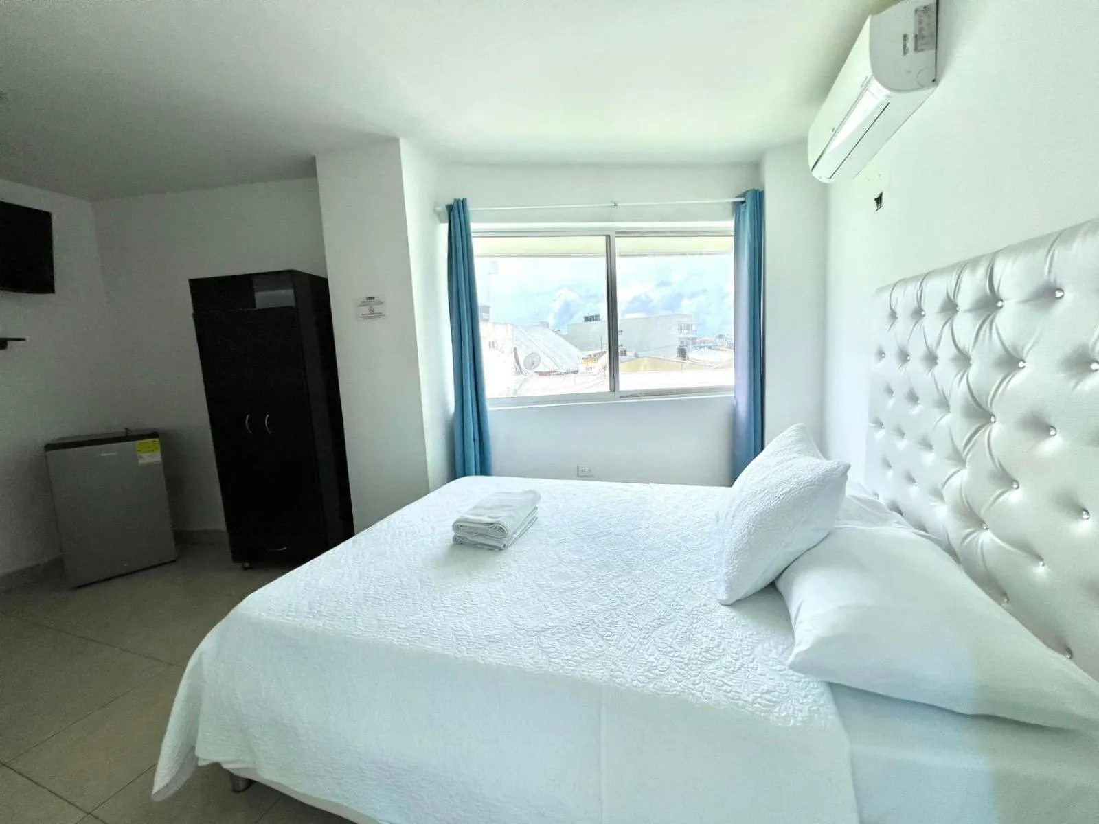 Bed in Caribbean Island Hotel