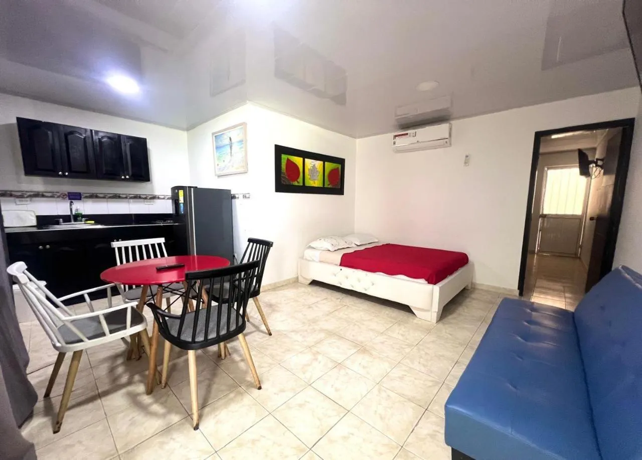 Kitchen or kitchenette, Bed in Caribbean Island Hotel