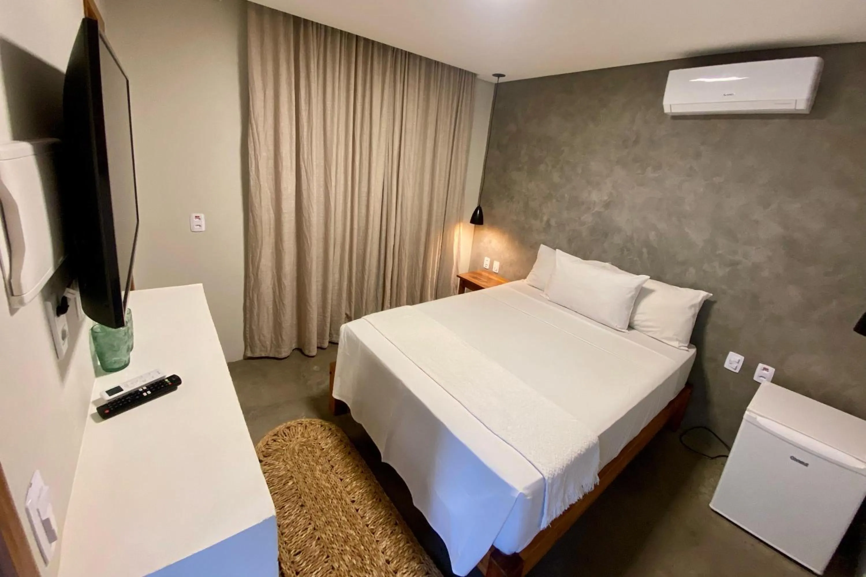 Bed in Pousada Baobá