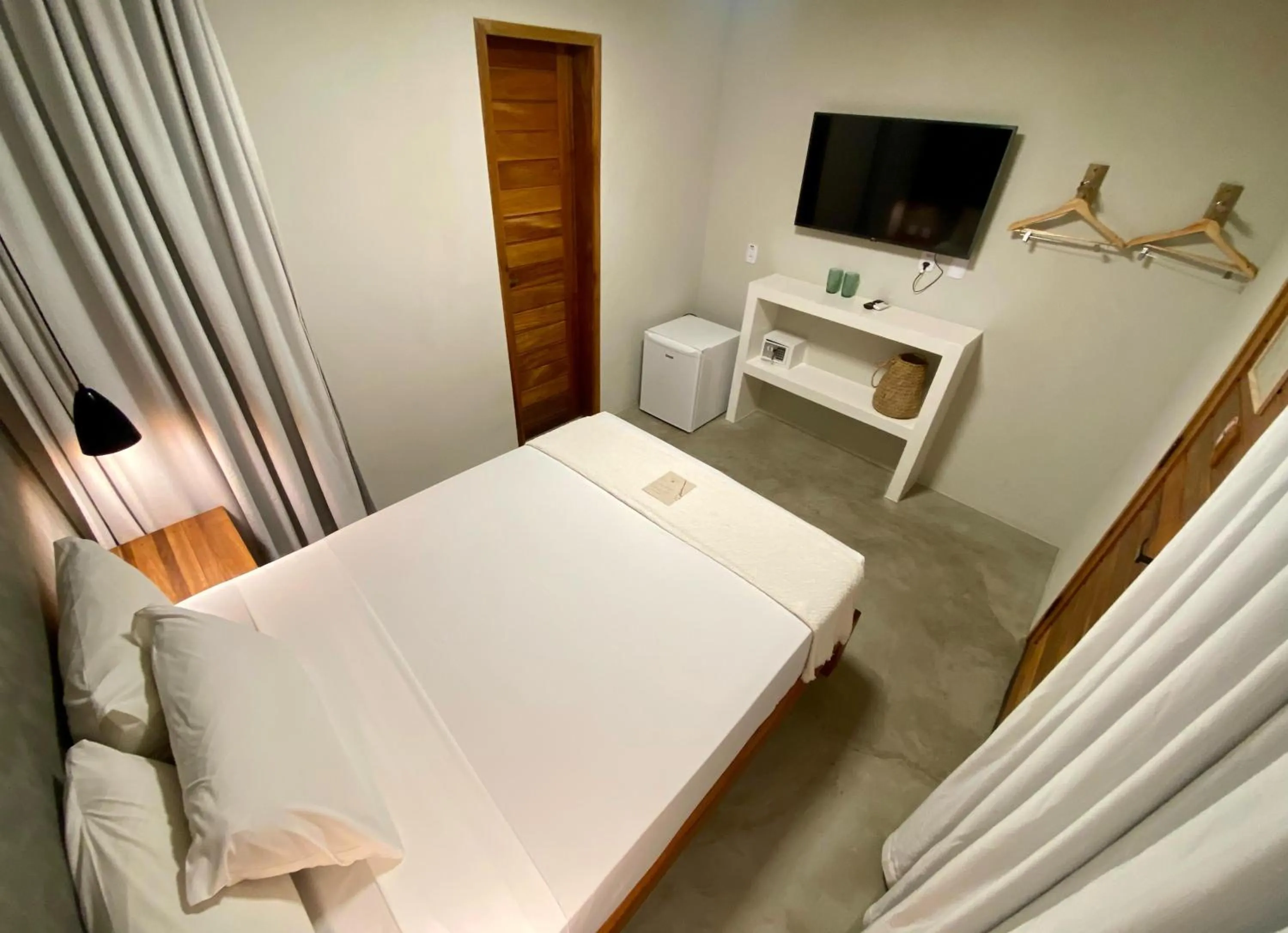 Bed in Pousada Baobá