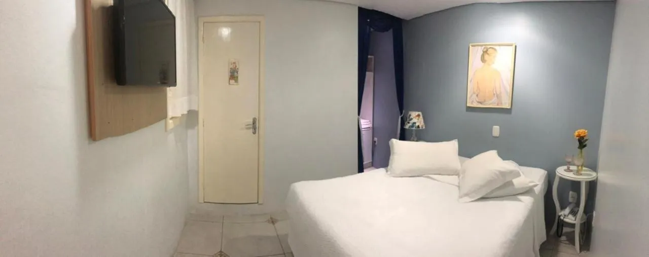 Bed in Hotel Imigrantes