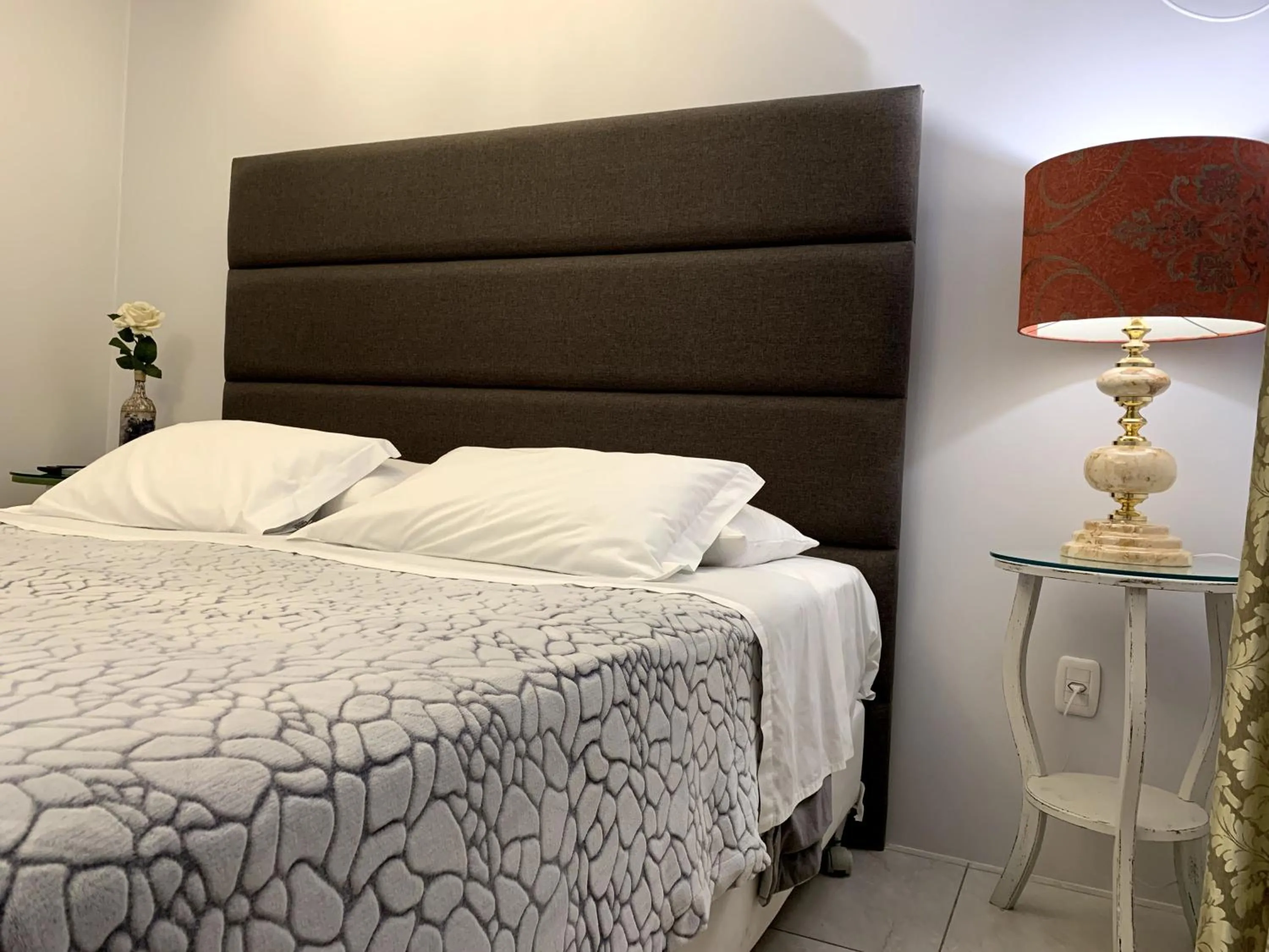 Bed in Hotel Imigrantes