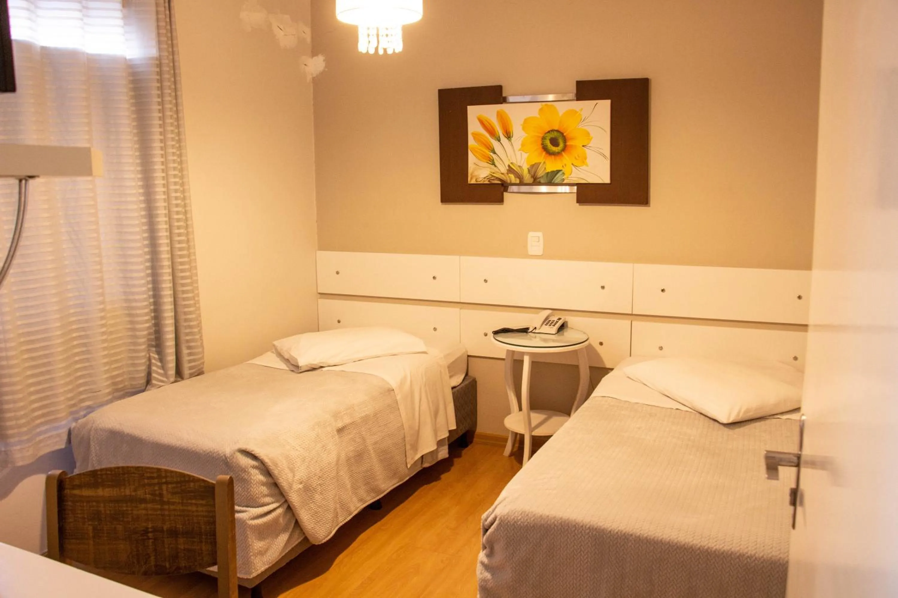 Bed in Hotel Imigrantes