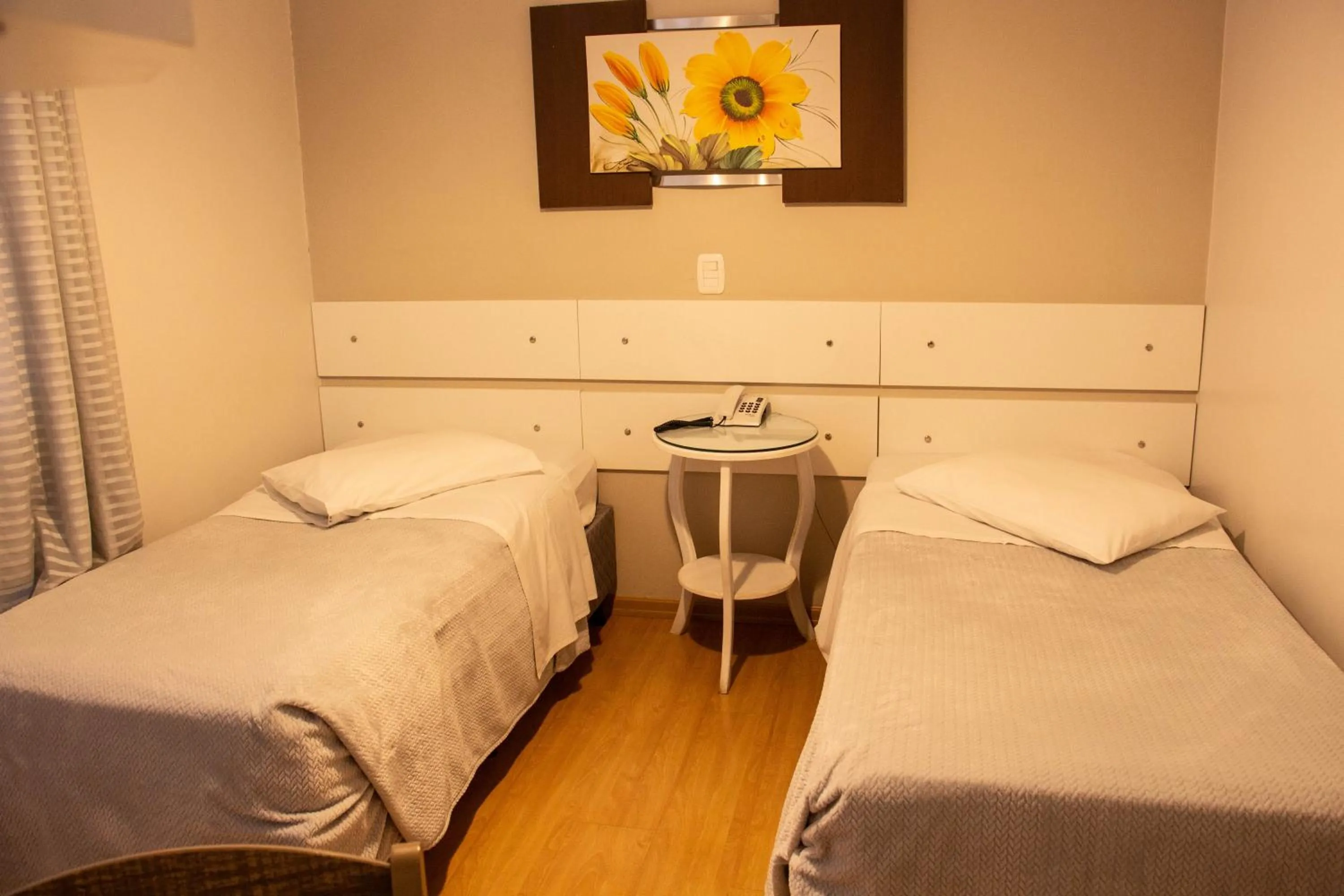 Bed in Hotel Imigrantes