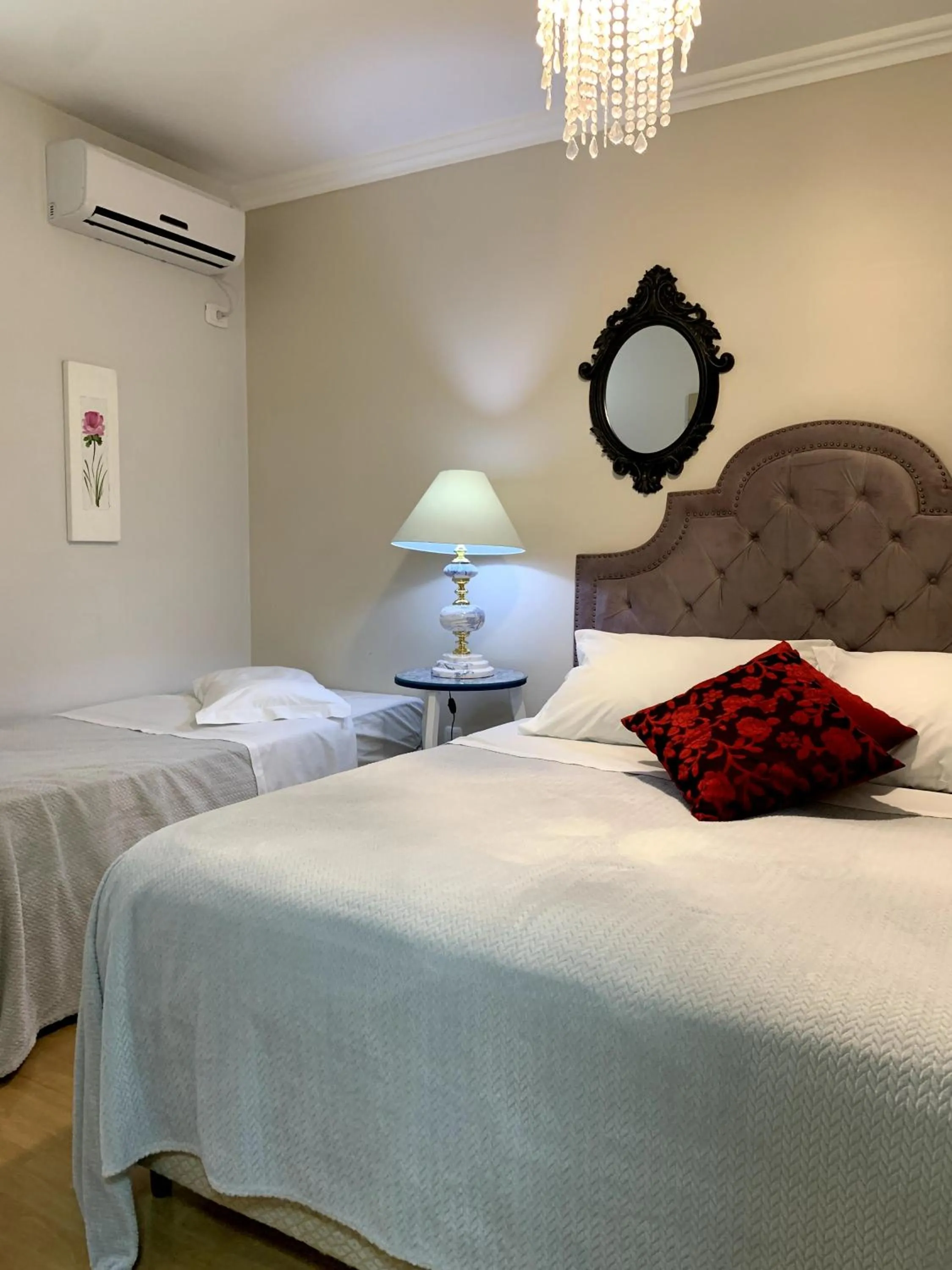 Bed in Hotel Imigrantes