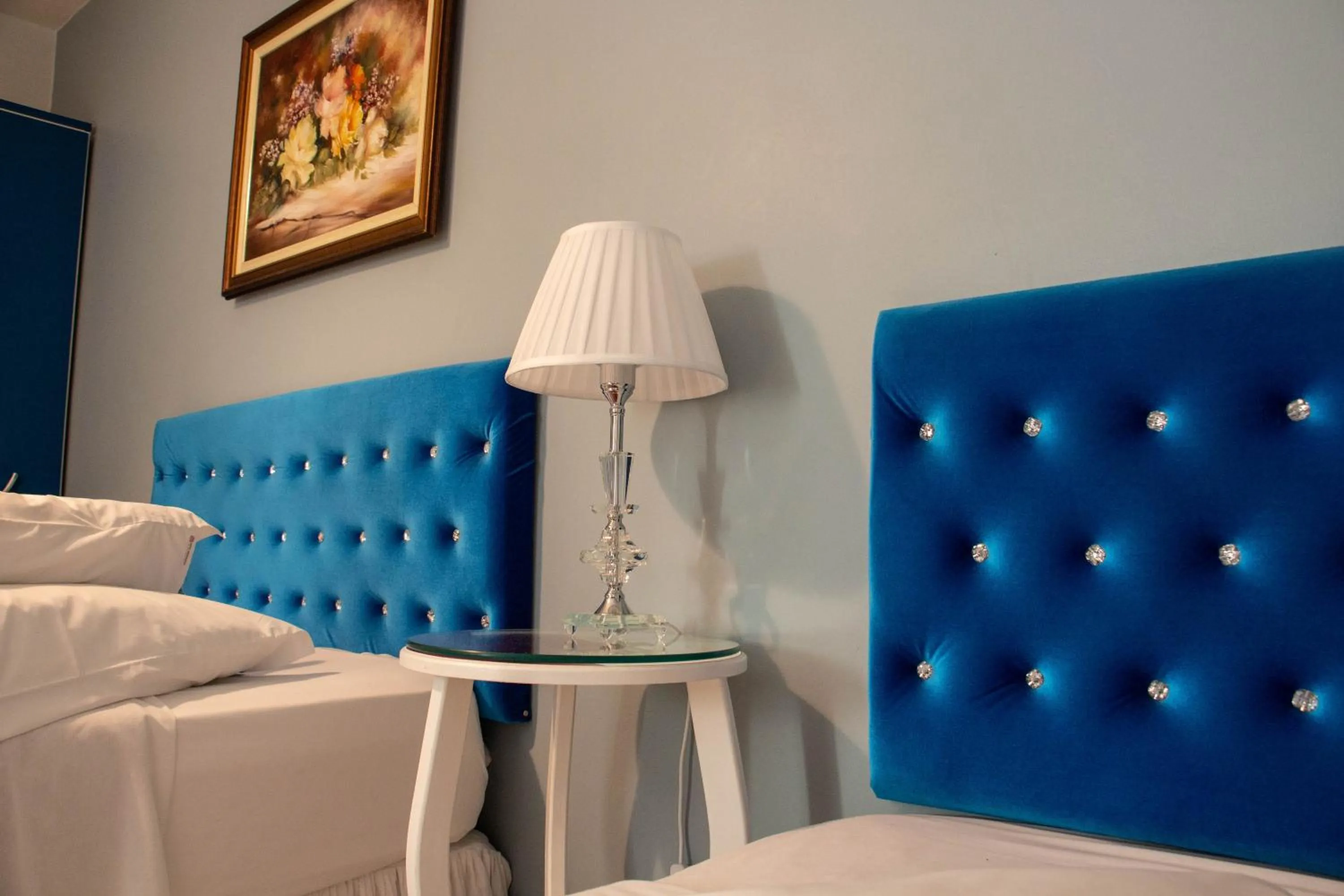 Bed in Hotel Imigrantes