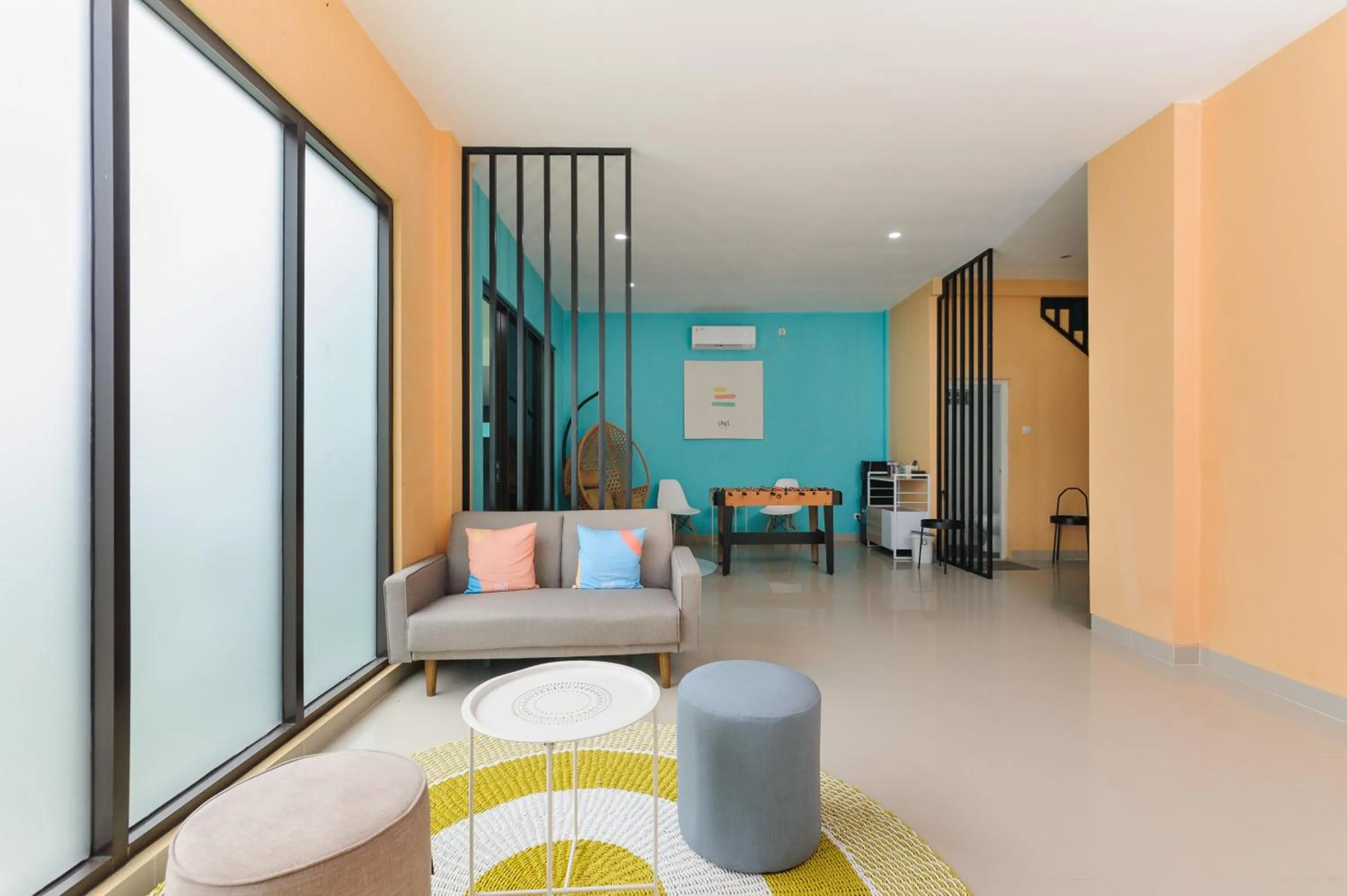 Seating area in Sans Hotel Cibanteng Dramaga Bogor