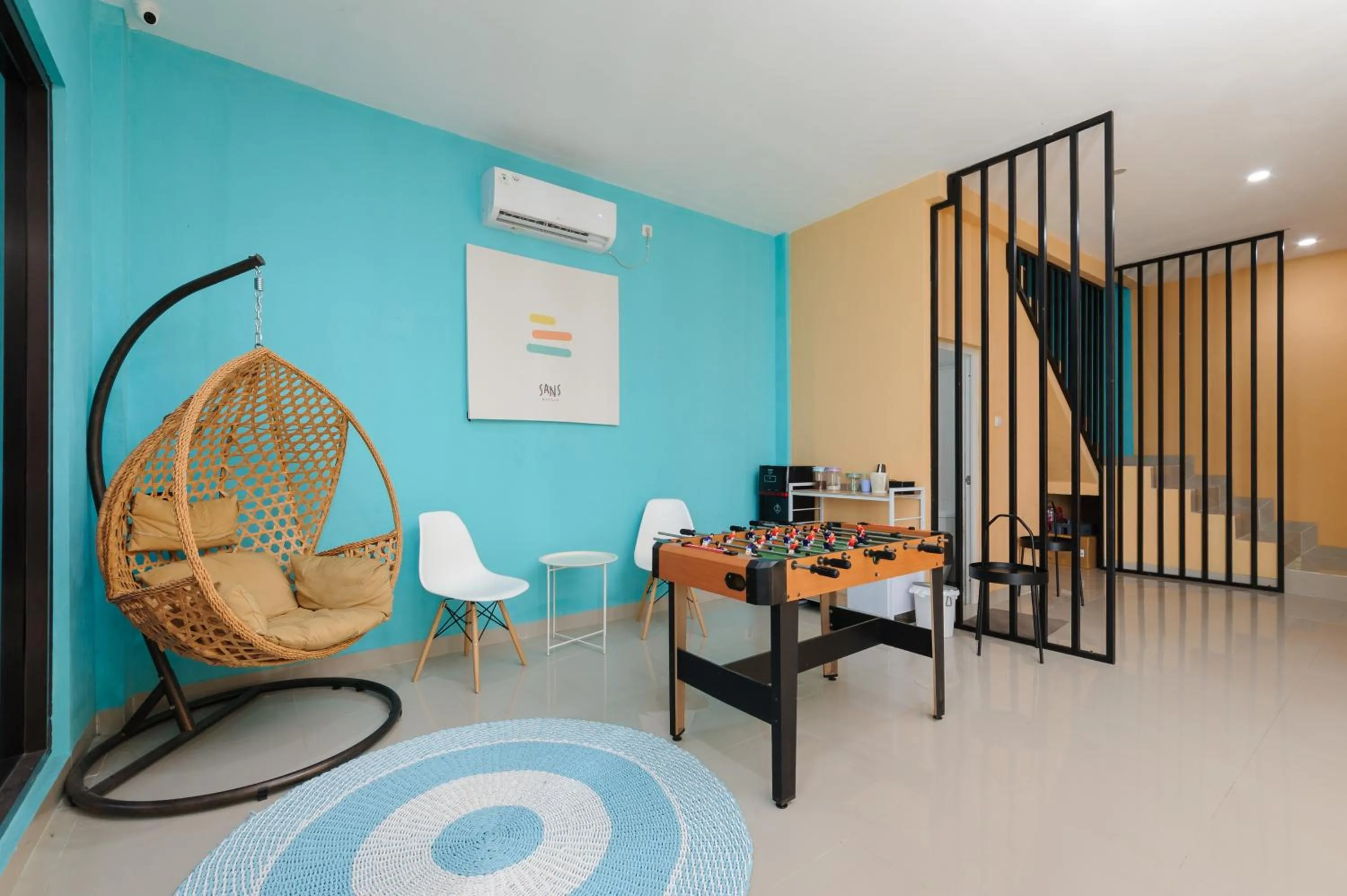 Seating area in Sans Hotel Cibanteng Dramaga Bogor