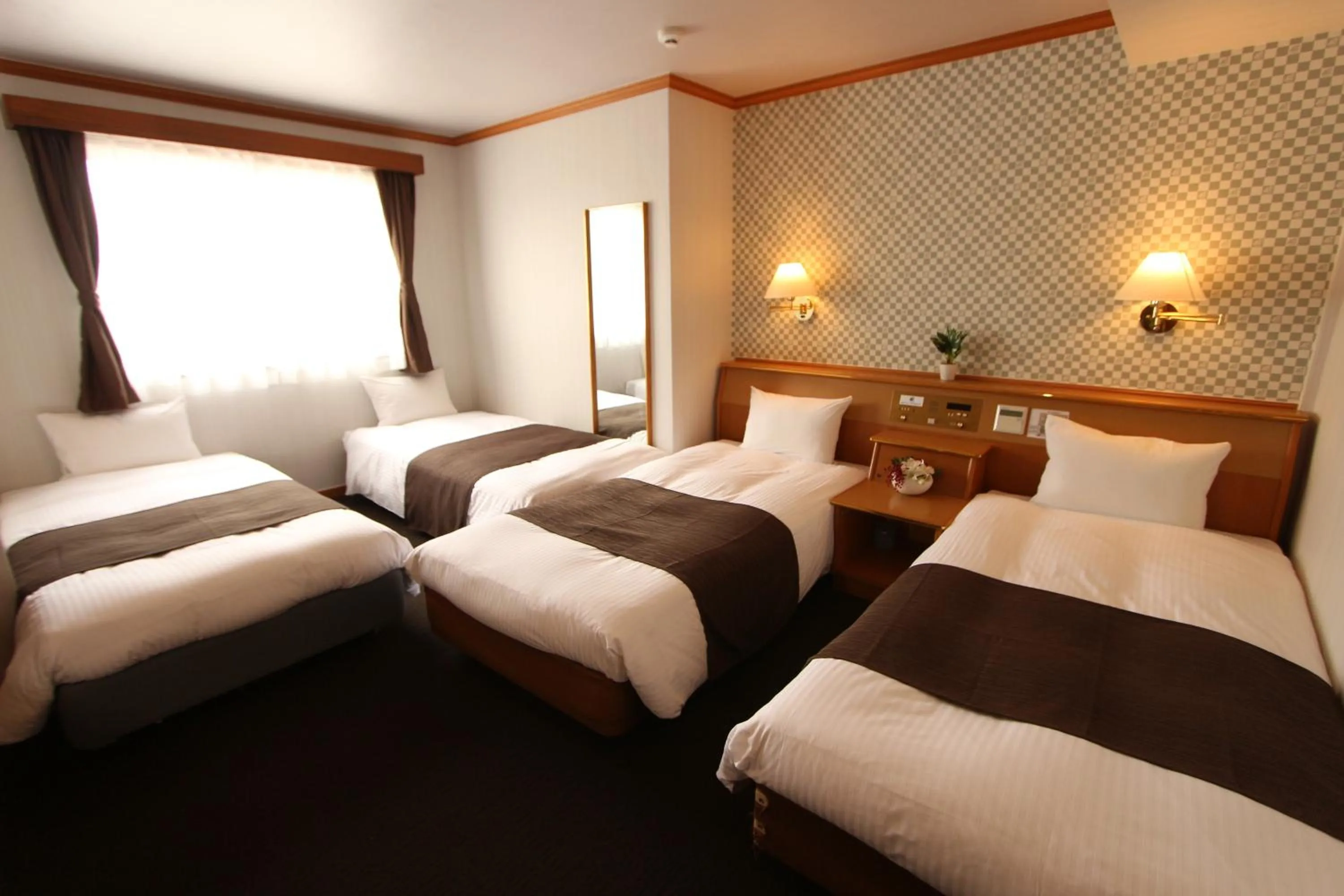 Photo of the whole room in HOTEL LiVEMAX BUDGET Okinawa Tomariko