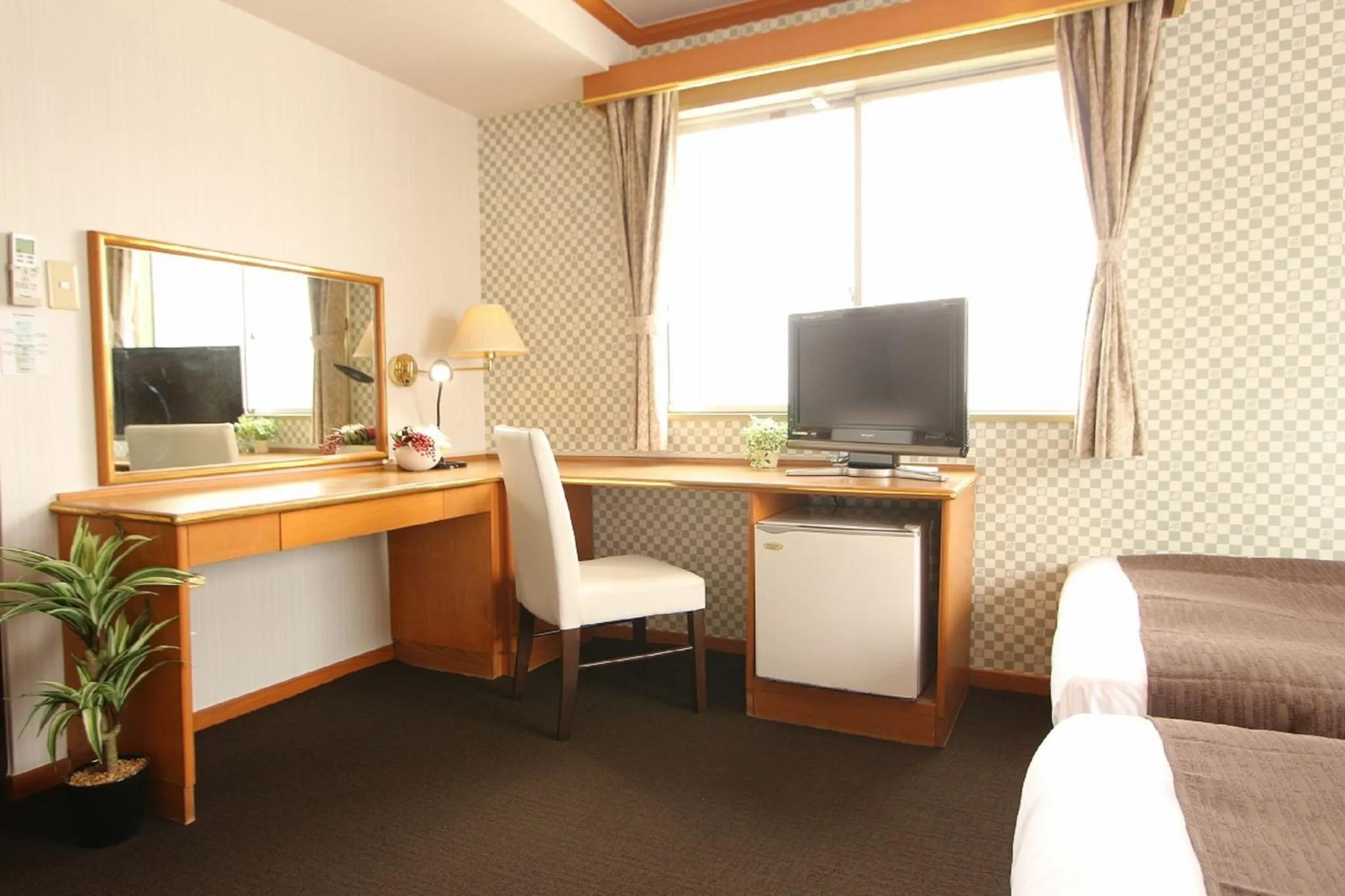 Bedroom in HOTEL LiVEMAX BUDGET Okinawa Tomariko