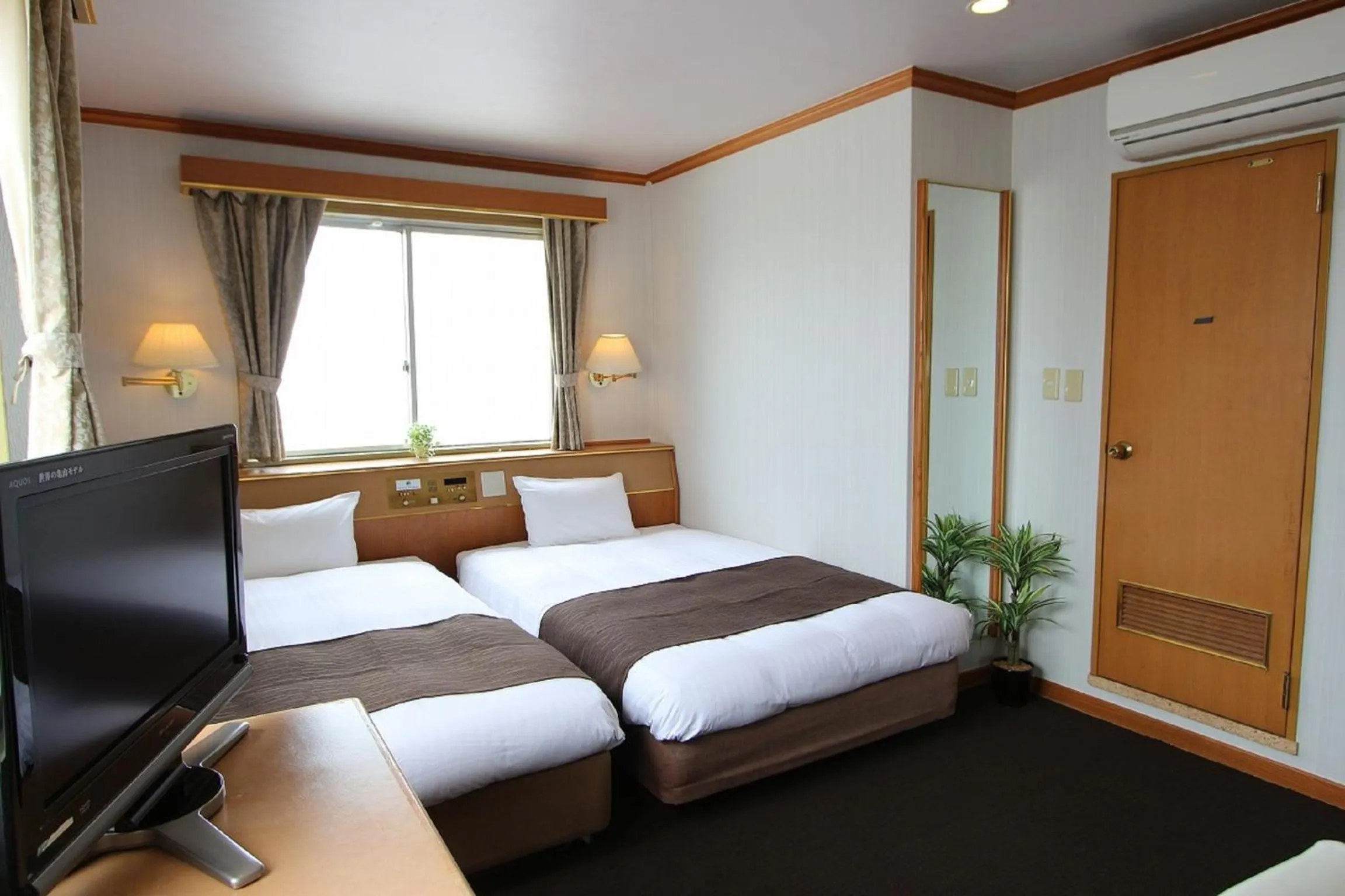 Photo of the whole room in HOTEL LiVEMAX BUDGET Okinawa Tomariko