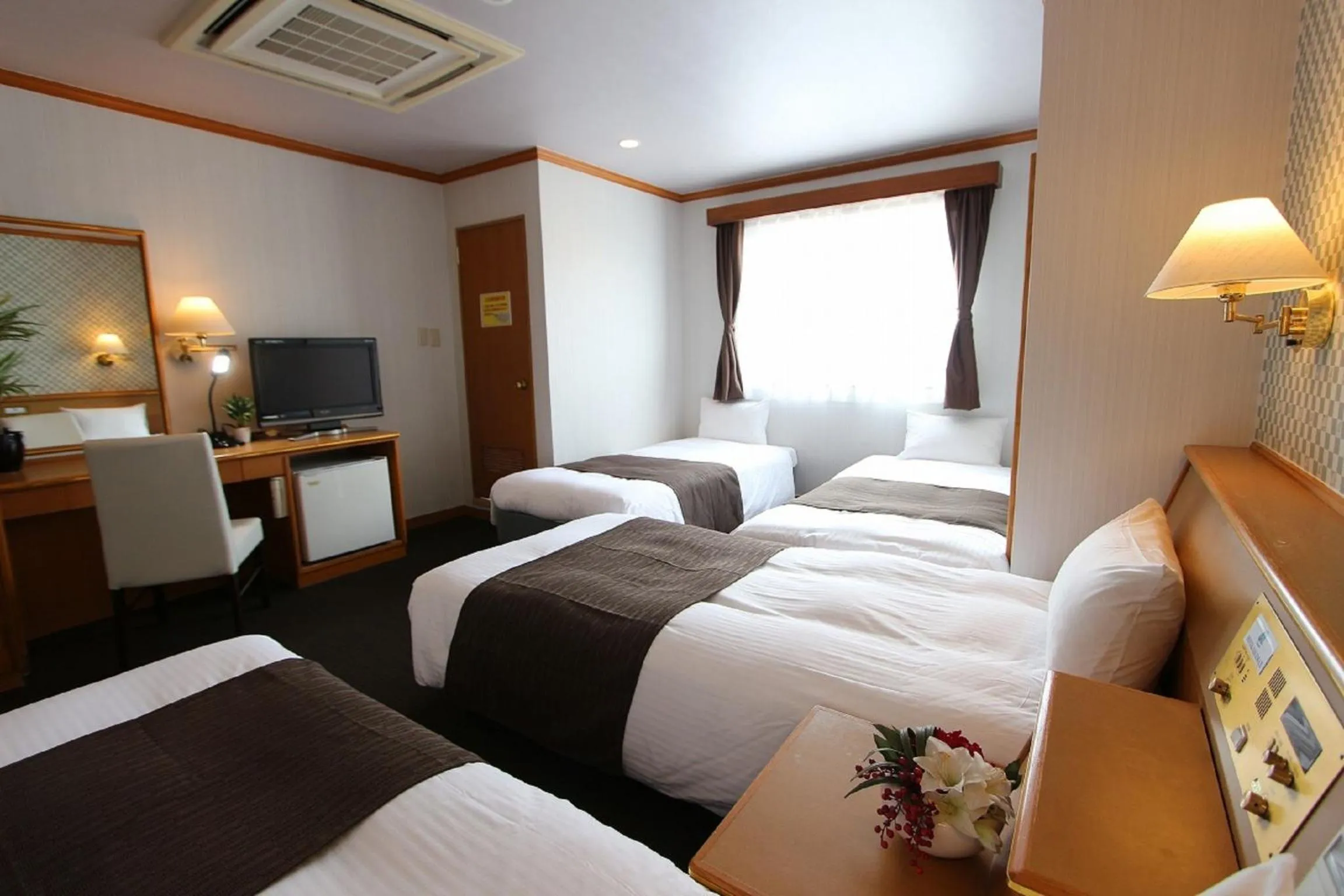 Bedroom in HOTEL LiVEMAX BUDGET Okinawa Tomariko
