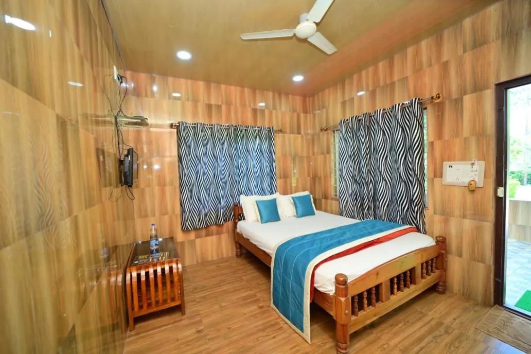 Bed in SIPAYI RESORT COORG