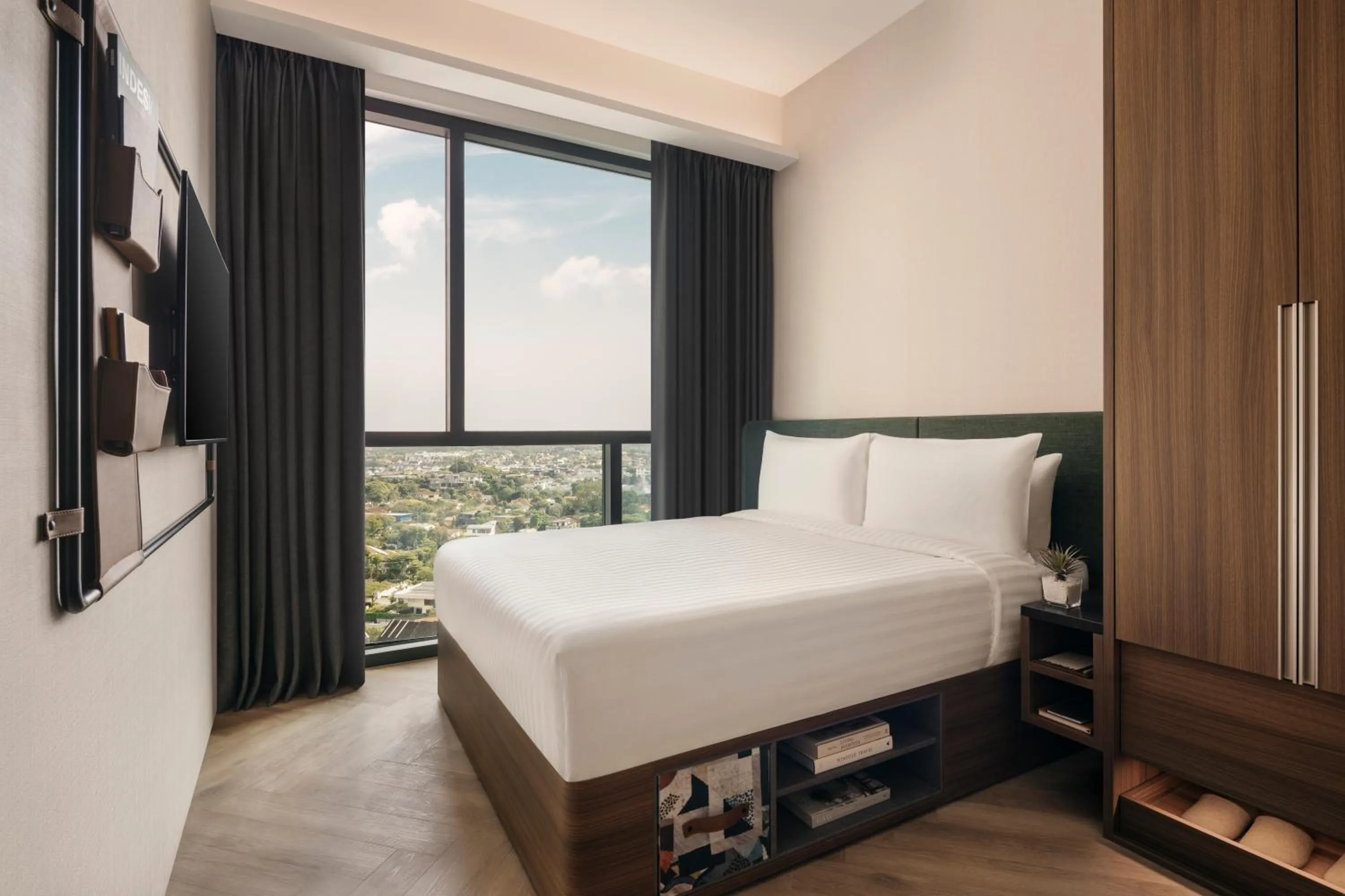 Bed in Quincy House Singapore by Far East Hospitality