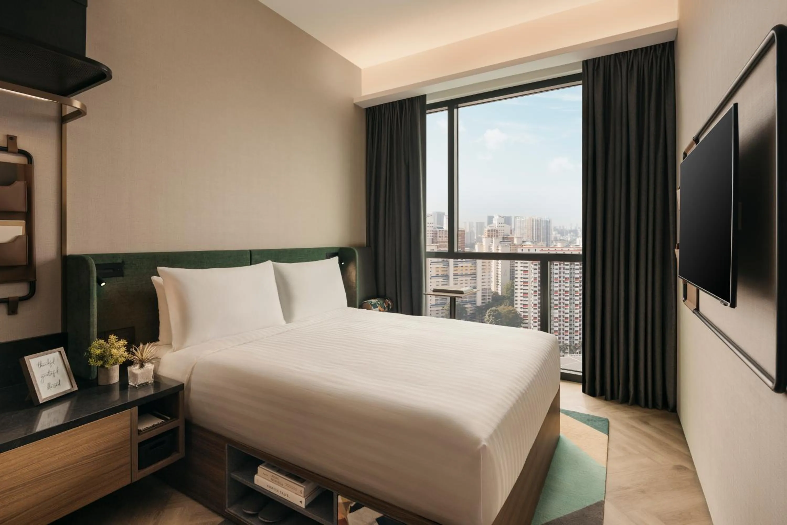 Bed in Quincy House Singapore by Far East Hospitality