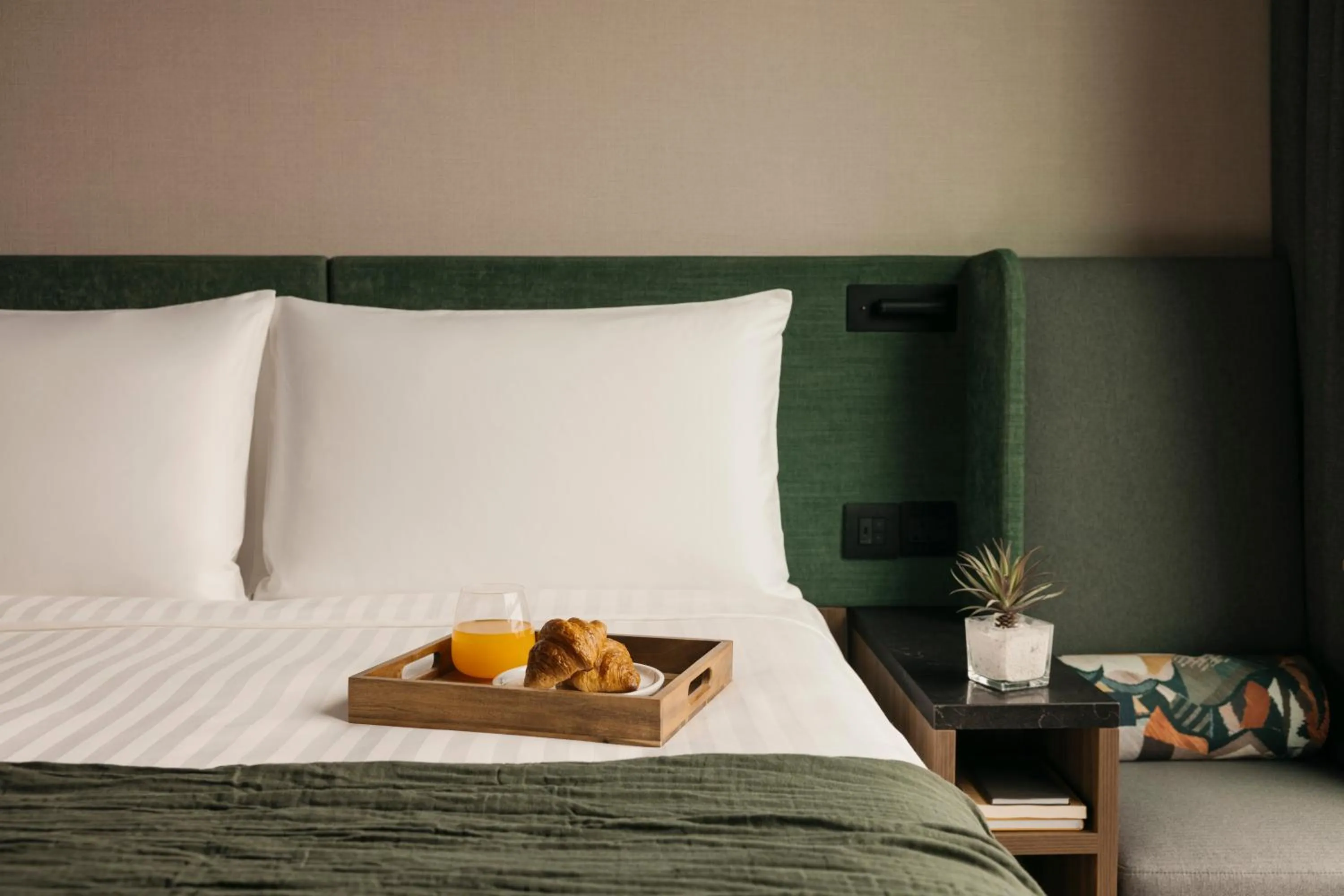 Bed in Quincy House Singapore by Far East Hospitality