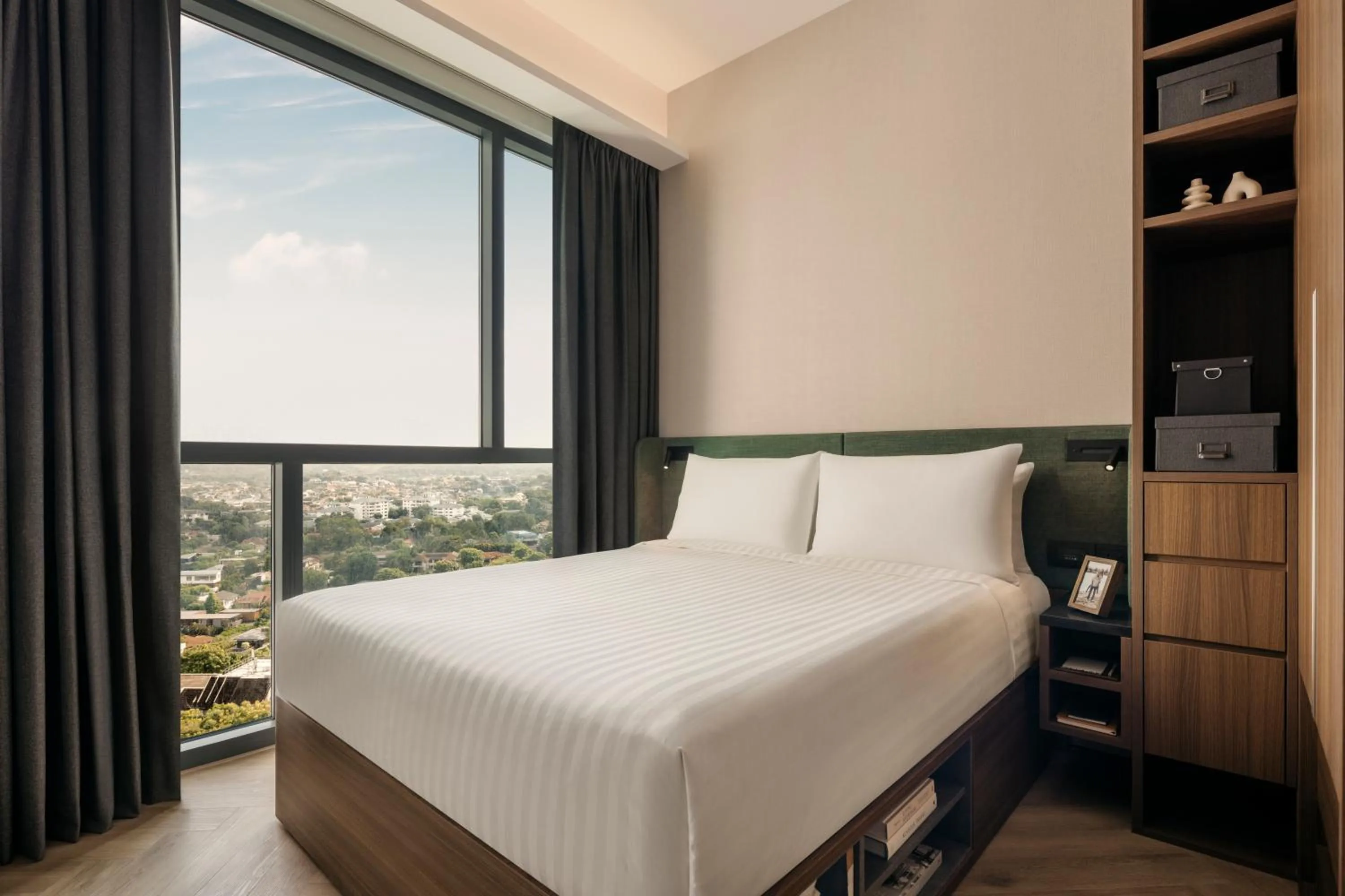 Bed in Quincy House Singapore by Far East Hospitality