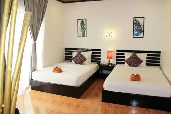 Bed in Golden Orchid Angkor