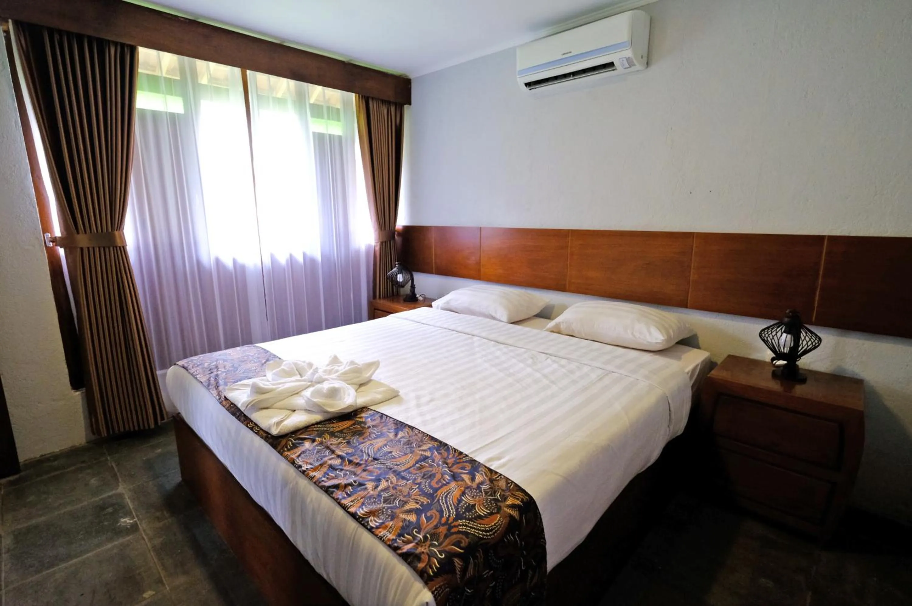 Bedroom, Bed in The Nalaya Hotel & Resto