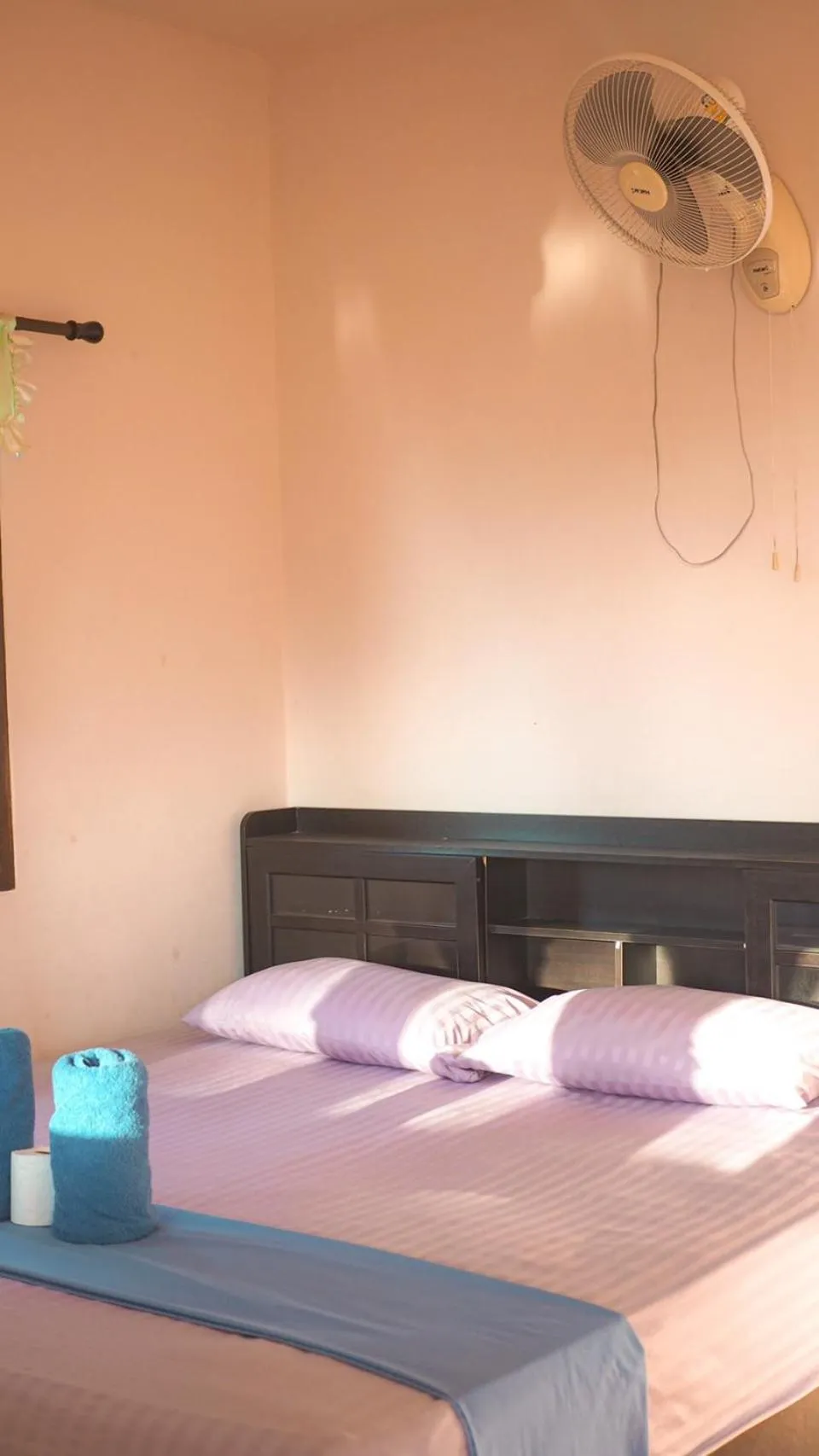 Bed in J.B.Hut Bungalows